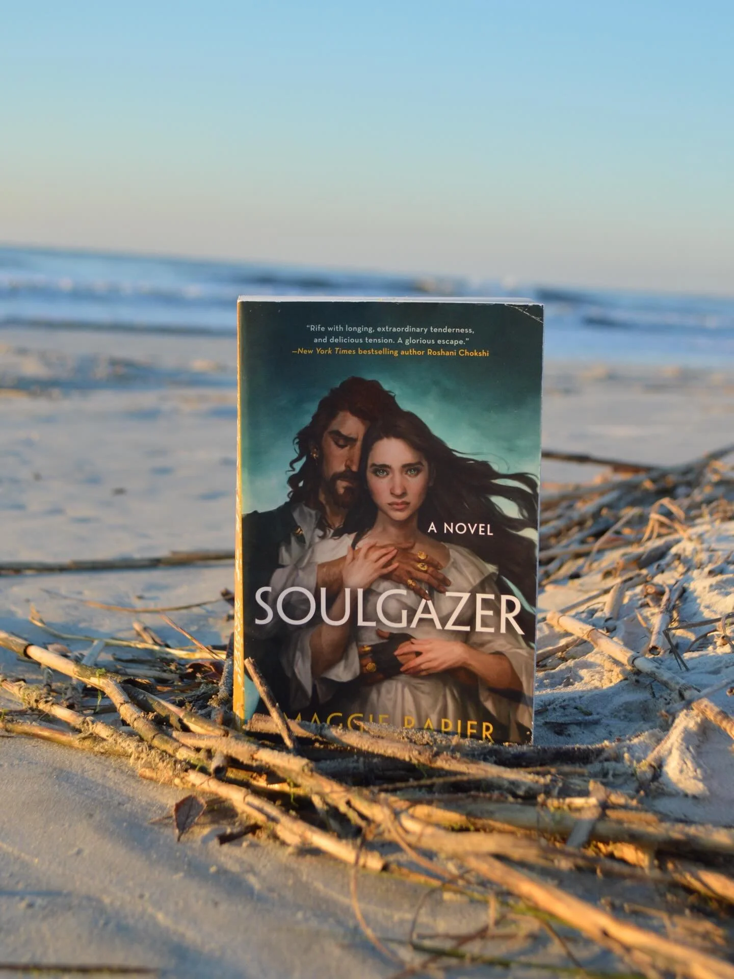 SOULGAZER is my soft girl romantasy that features cursed magic, s&euro;xy pirates, light spice, and lots of yearning. It&rsquo;s a book for the moody girls&mdash;the ones who never got over Sinbad or Hook from Once Upon a Time, who&rsquo;ve never fel