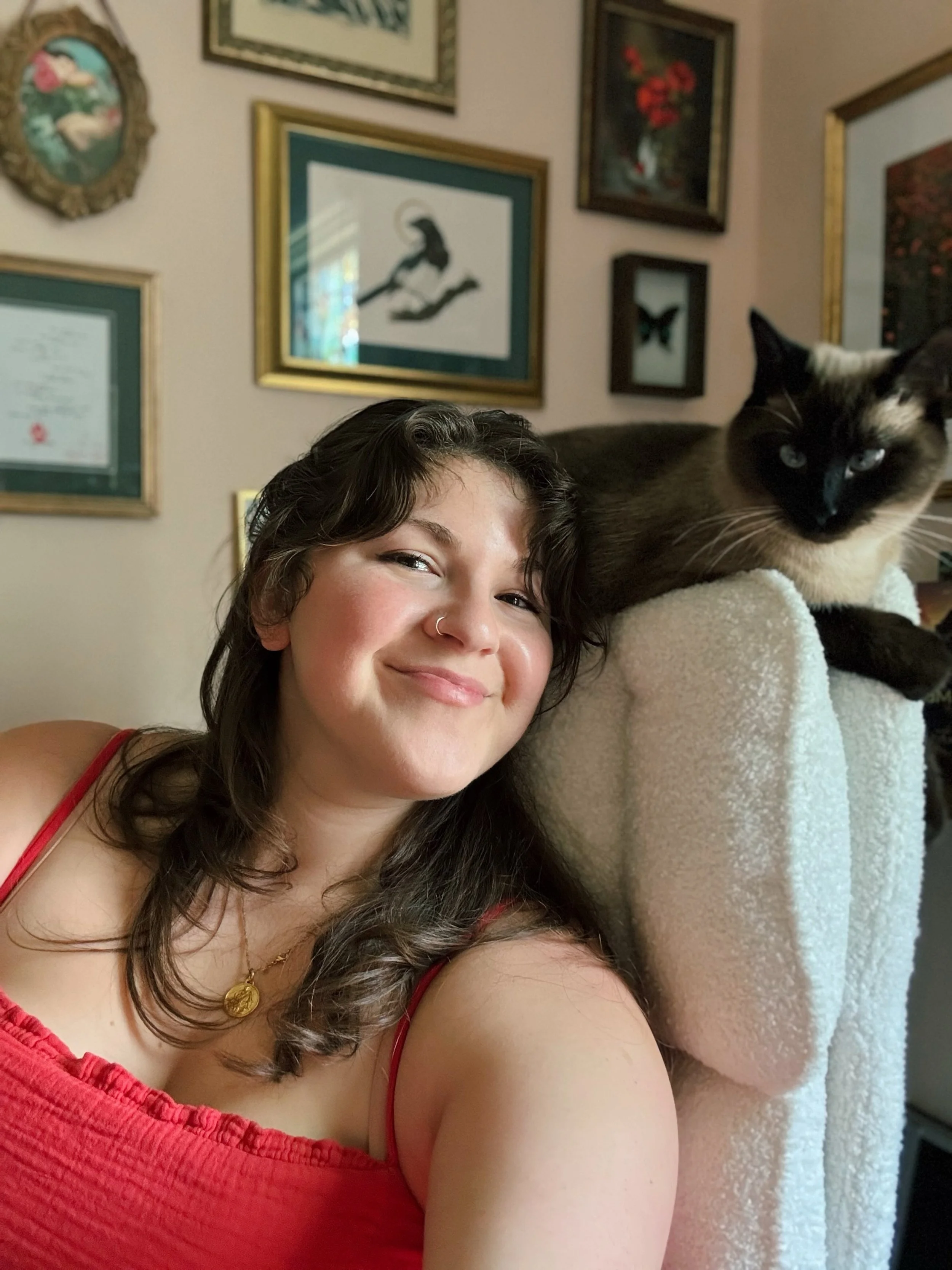 I tried to film something to market my books, but everything felt weird so you get a selfie of me and my cat instead. 

2 weeks til Wolftamer!!! If you want to preorder the book and get the pretty art print, please do so soon as I am ordering them in