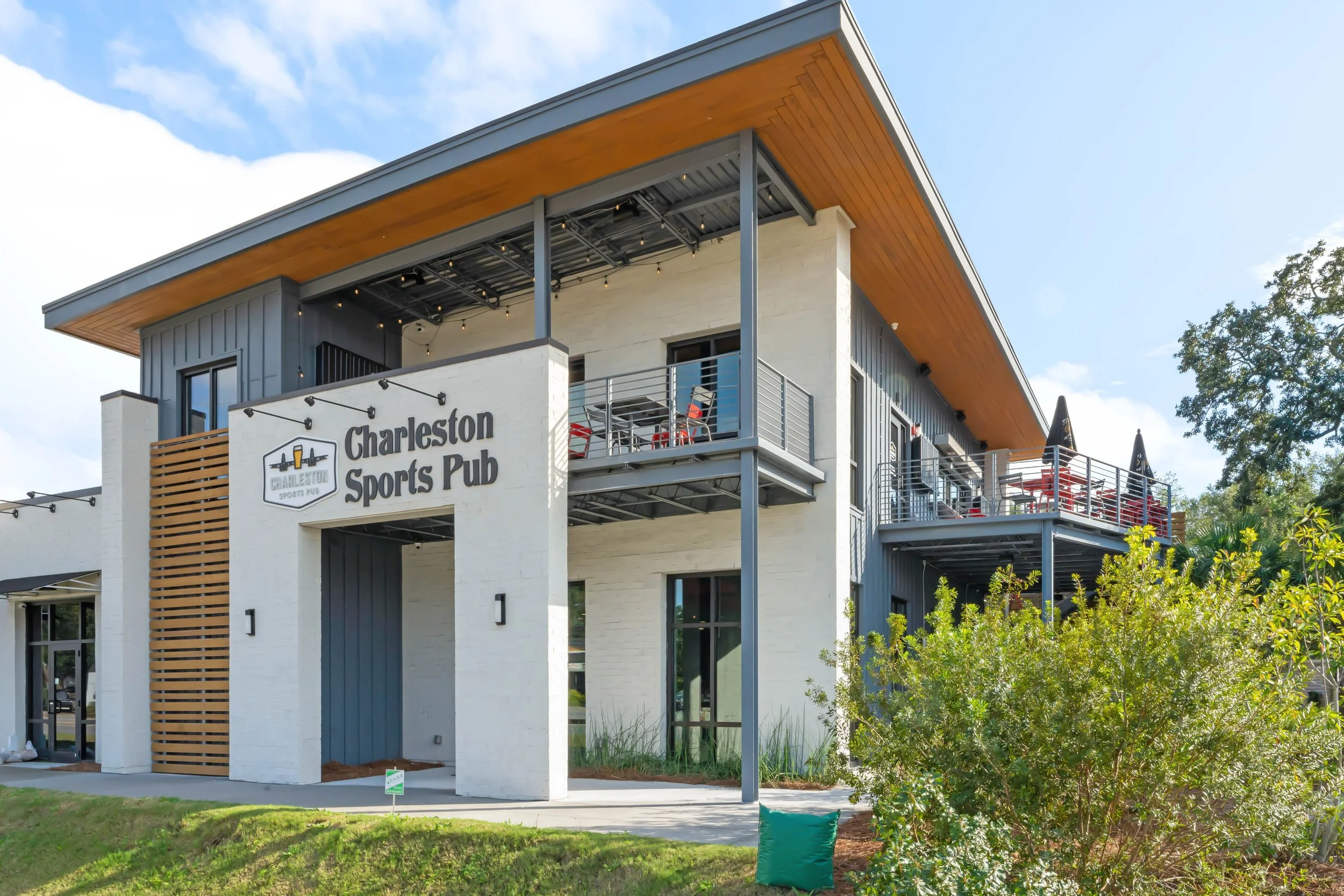 Charleston Sports Pub | James Hardie Vertical Siding and Custom Wood Ceilings