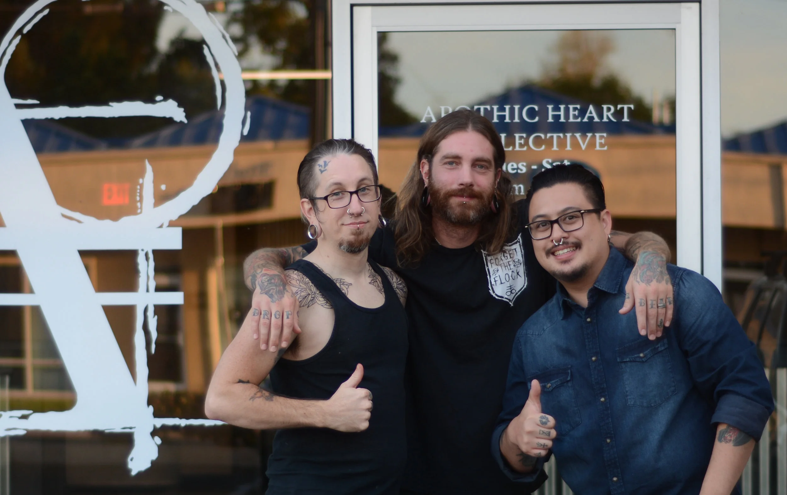 Apothic Heart Tattoo Collective Owners from left to right: Eric MacLachlan, Keith Cromie, and Andre Garcia