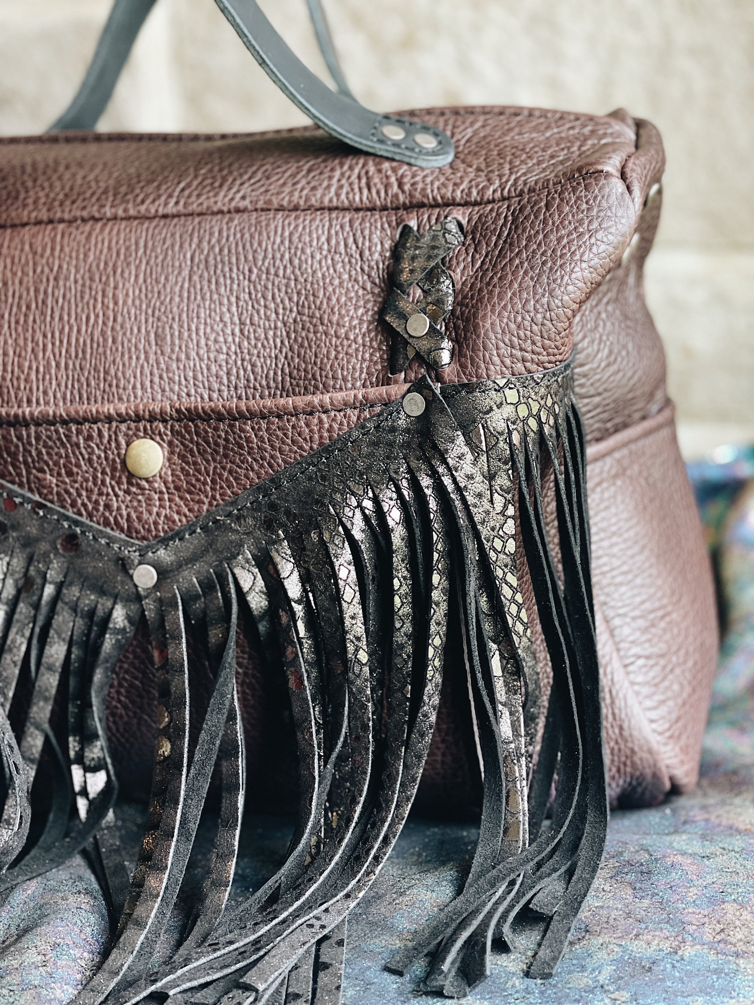  BODY: chocolate bison leather  FRINGE: custom requested*** black python leather  ADDITIONS: 2 simple handles  