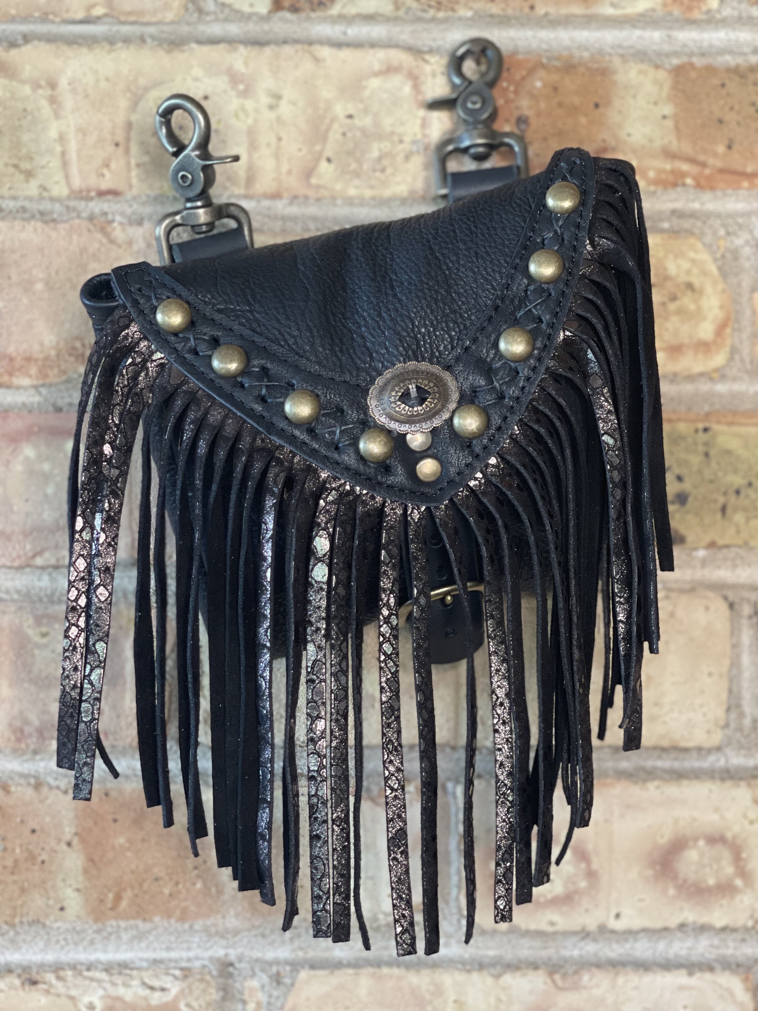 On The Road Hip Bag in Black Bison, Black + Silver Python Fringe, Black Criss Cross Handstitching, Studs, and a Concho