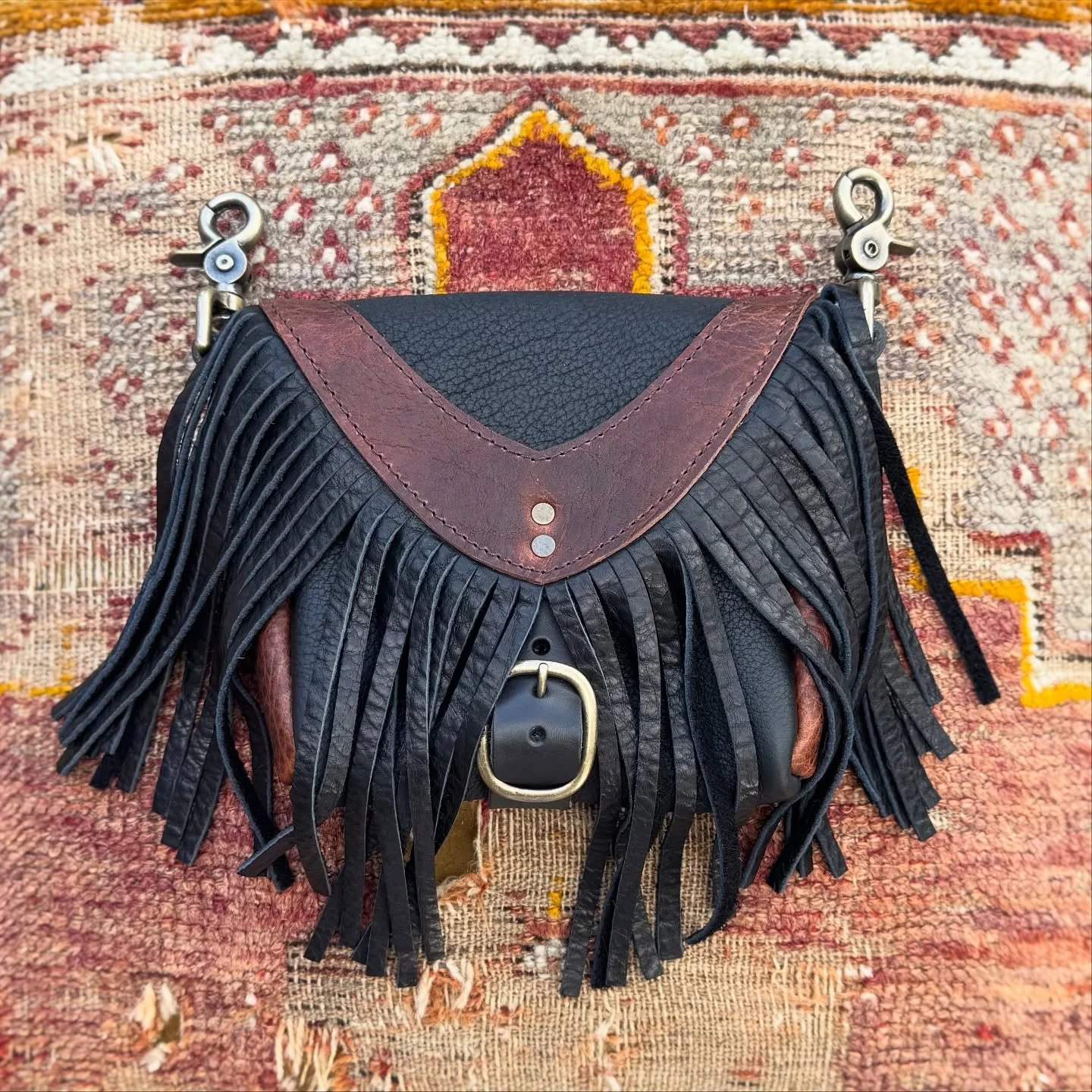 Close up so you can see the texture in the leather.

Small batch handmade, available online &amp; at my exclusive retailers.