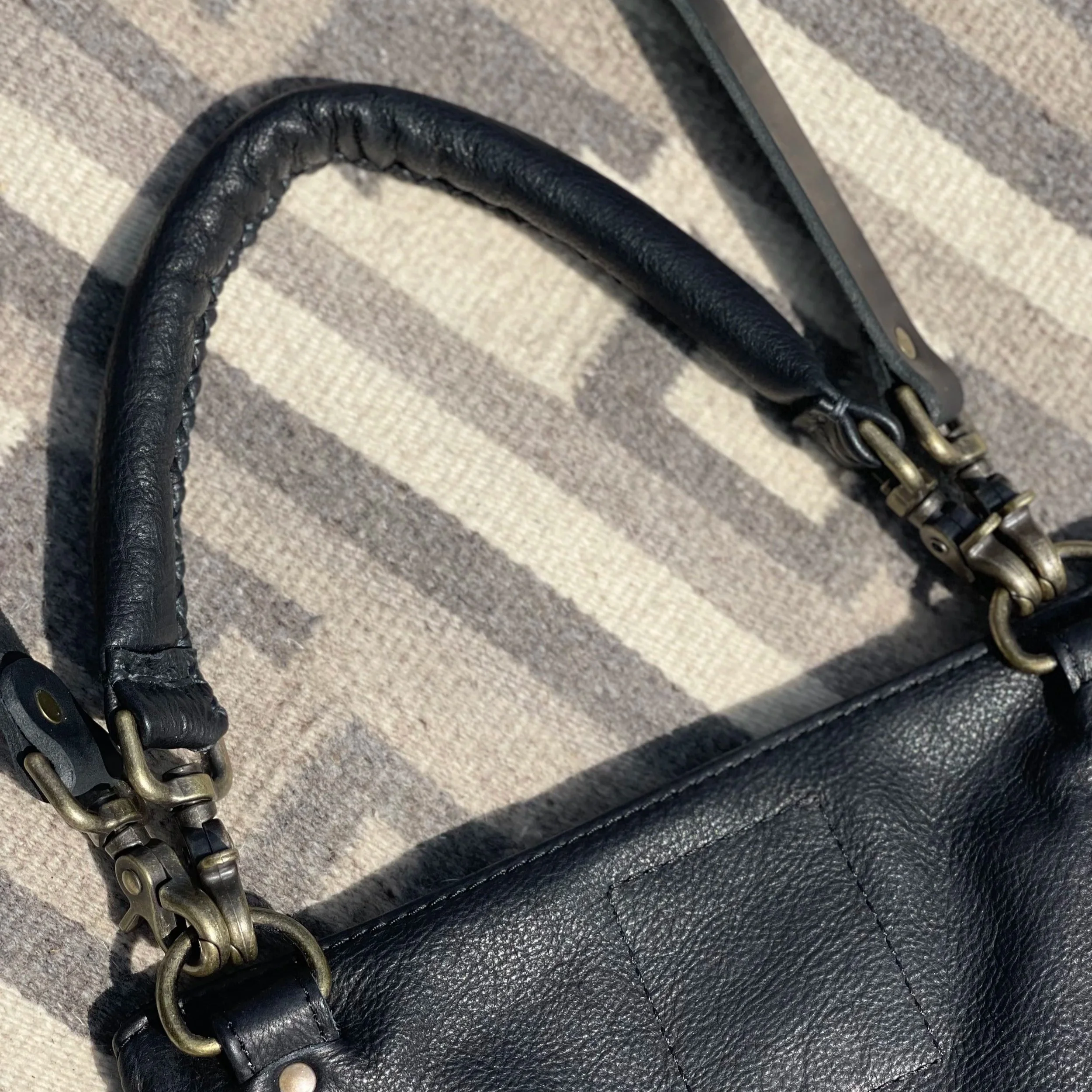 CLIP ON SOFT PUFFY HANDLE WITH X STITCHING