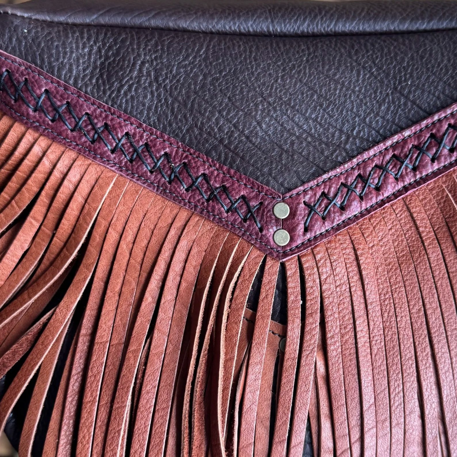 BLACK CRISS CROSS HAND-STITCHING