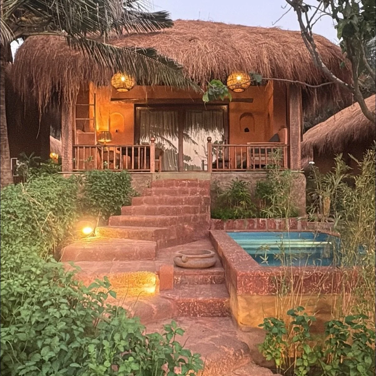 Lighting up for Sunset over our &rdquo;Little Palm Grove&rdquo; 
Made with old Goan technique of Mud and Wood and a large portion of Passion. Warm Welcome to explore it. Reserve your holiday by the beach. 

[Goa Bungalows Ashvem Beachfront Mud]