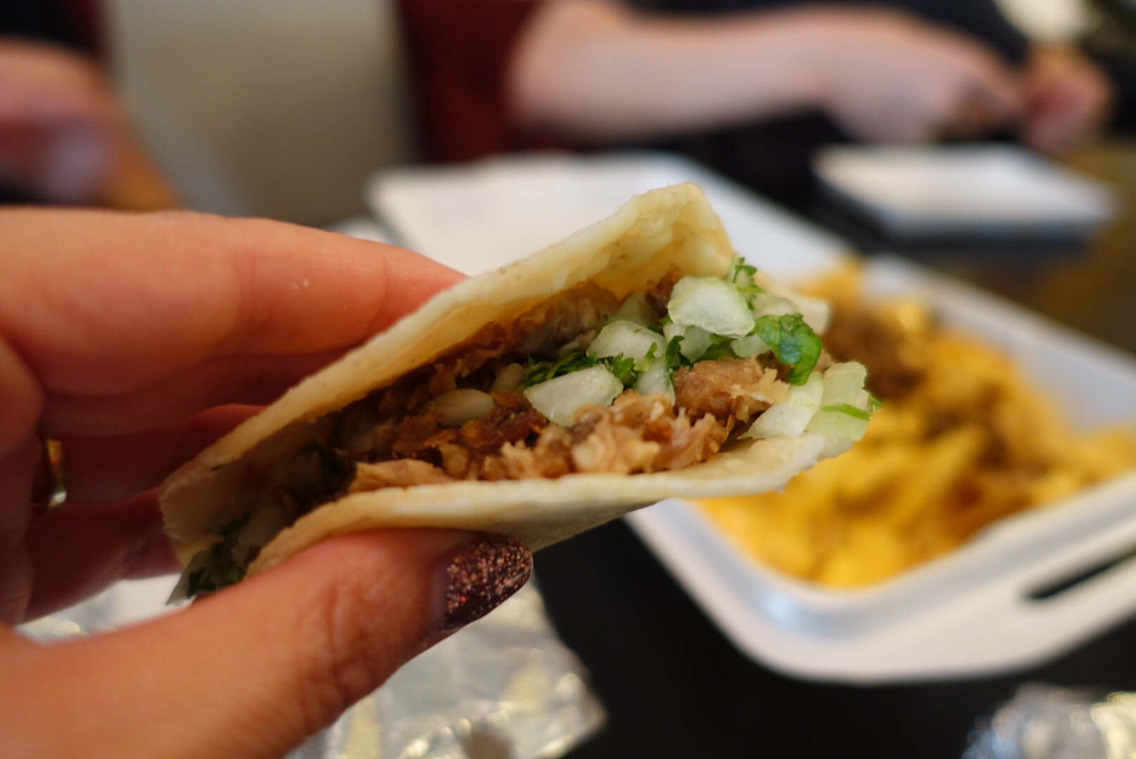Tasty little taco from King Taco. We also had a carne asada burrito with lots of red sauce.