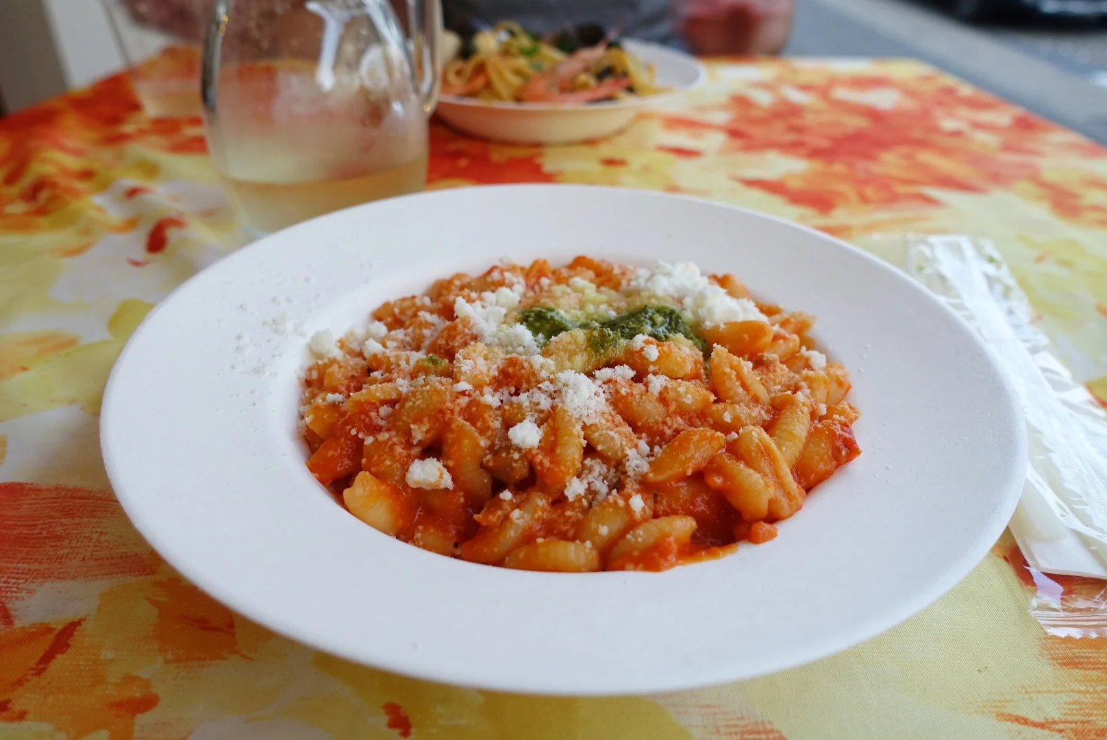Classic Sardinian pasta – Malloreddus with tomato and sausage.