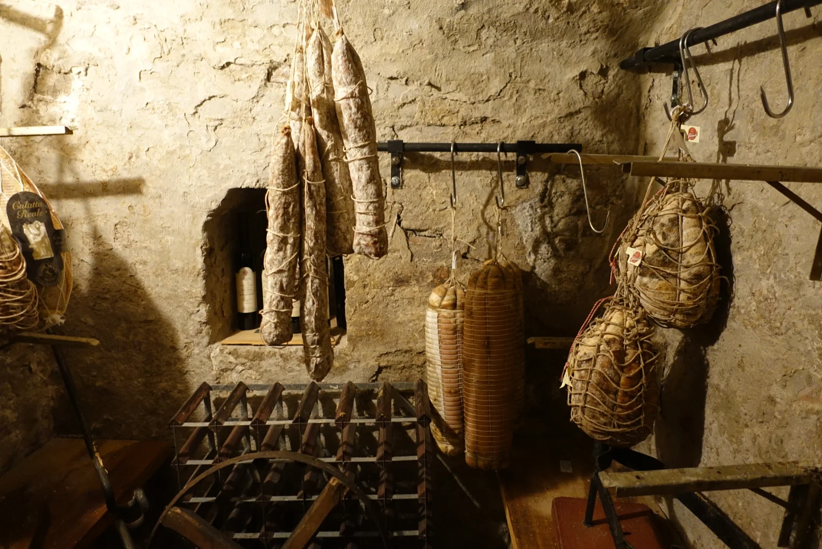 Heading downstairs to the bathroom, you can walk past this cellar where they store the meats.