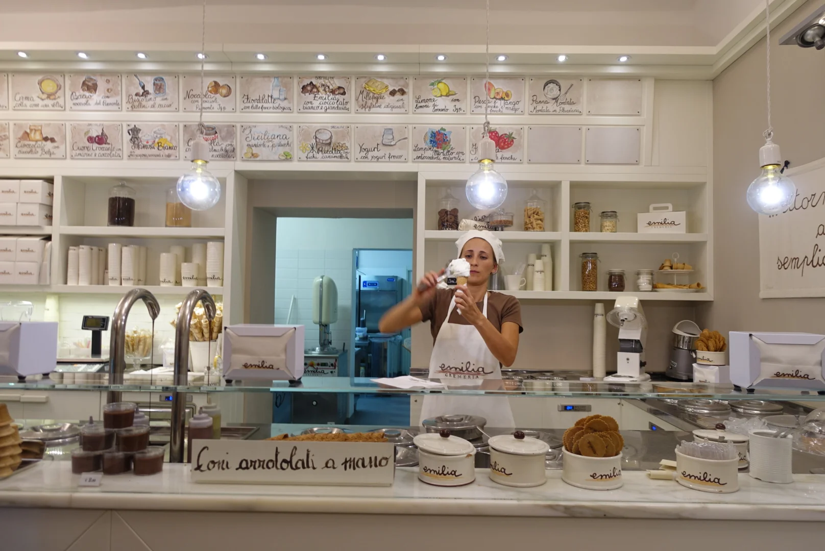 This place was super busy so we wanted to check it out. Emilia Cremeria made fresh gelato and see those taps on the left? They were chocolate taps where you can choose dark or milk chocolate to fill your cone with.