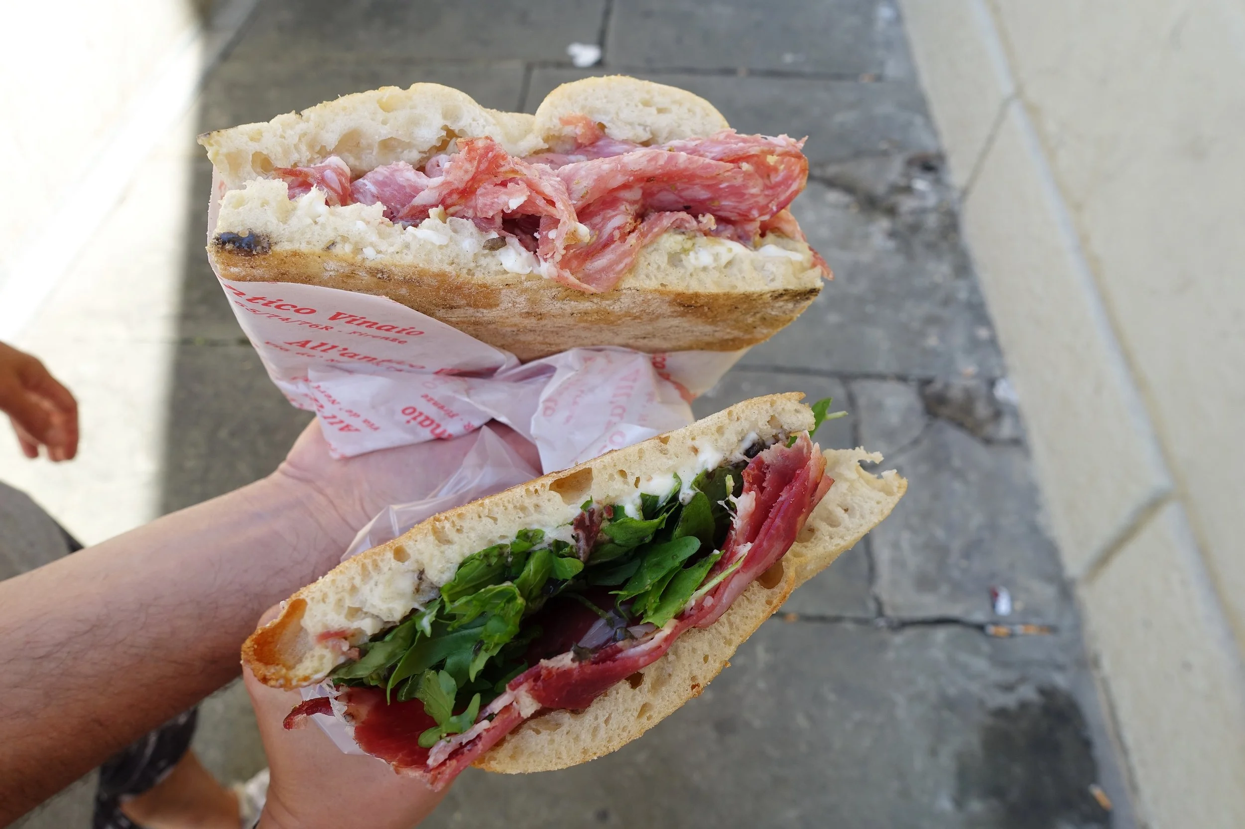 The plan was to get one panini to save on money and calories but considering the wait, we decided it would be crazy to just get one. These guys (we ordered the La Favolosa and La Dante – see menu above)&nbsp;were massive and I had to agree – these w…