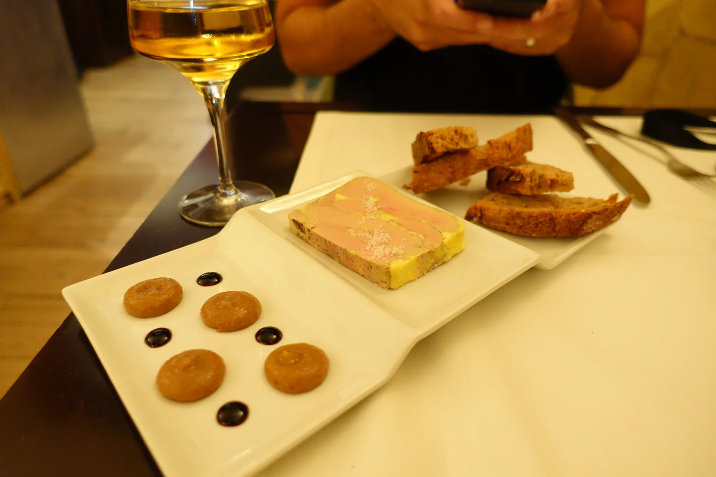 A popular locals spot, this is the place Edgard suggested we go for dinner. Luckily for us, the French eat late, so we were able to get a spot at 7.30 with no reservation.&nbsp;Here is the foie gras with the sauternes in the background.