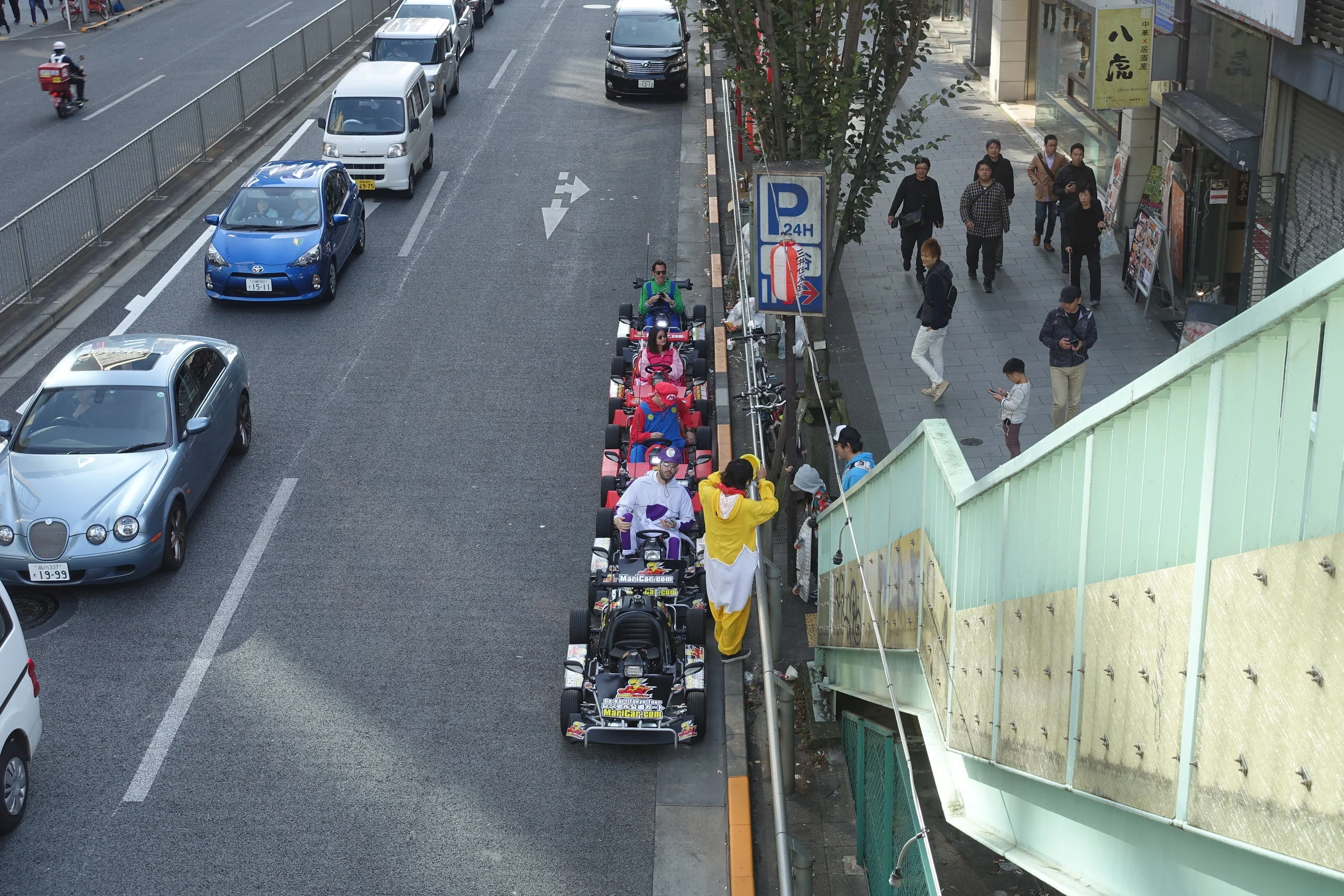 These Mario Kart things where you drive around the streets of Tokyo are kind of touristy but I really want to do it one day.