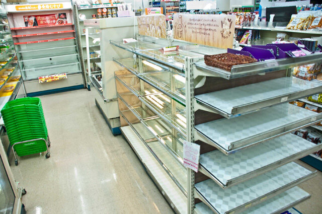 Panic sets in and people hoard any food they can. This convenient store was cleaned out.