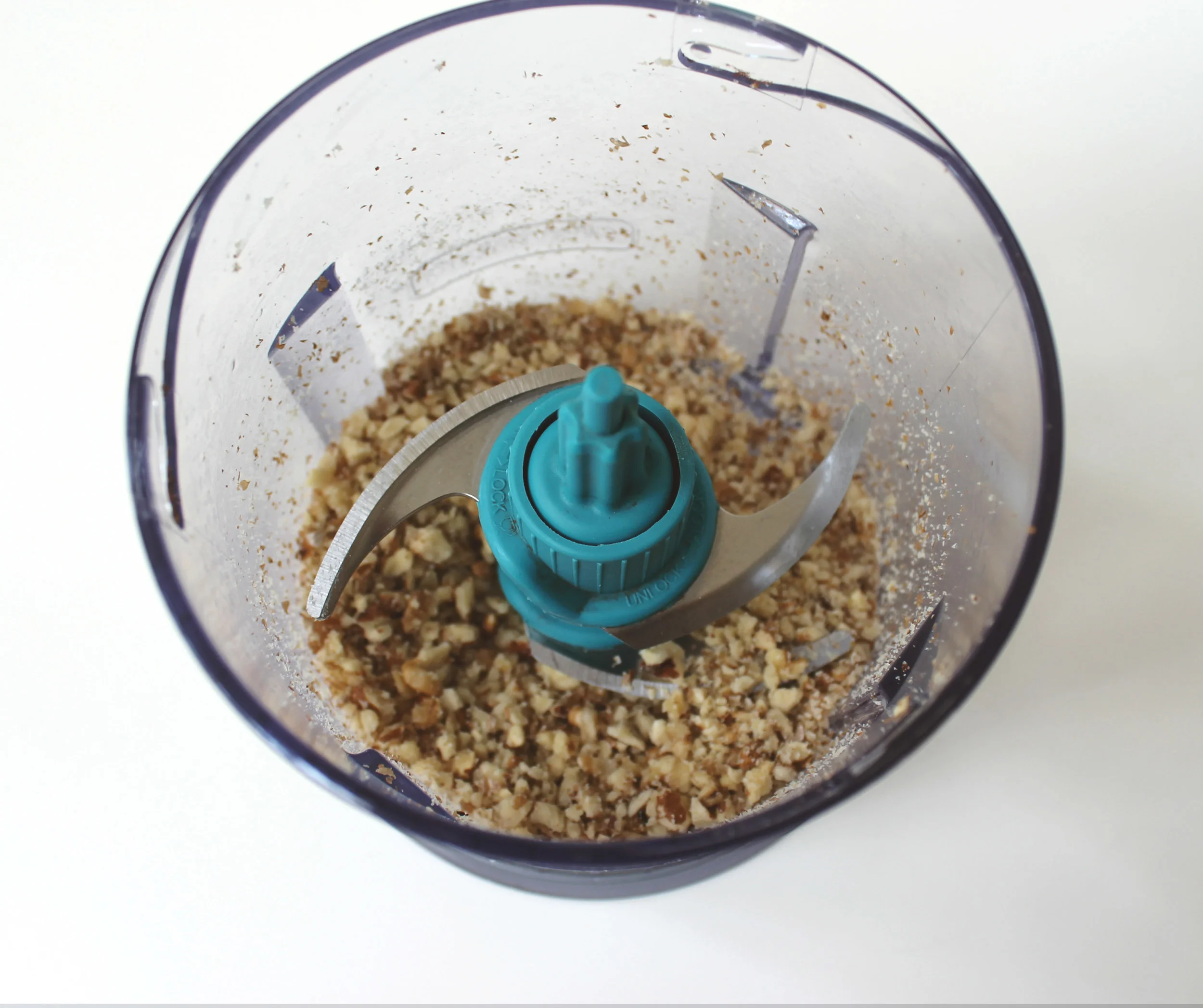 to make things easier for me, I chop the walnuts and almonds in the blender