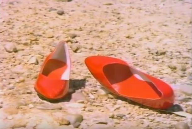 "Put on your red shoes and dance the blues". The red shoes from the Let's Dance video clip.