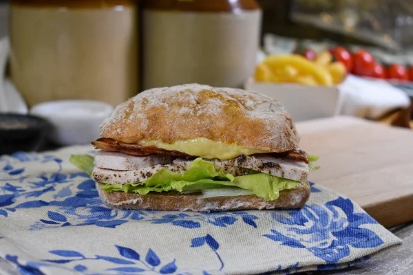 Brown Ciabatta with lettuce, grilled chicken, bacon and melted cheese