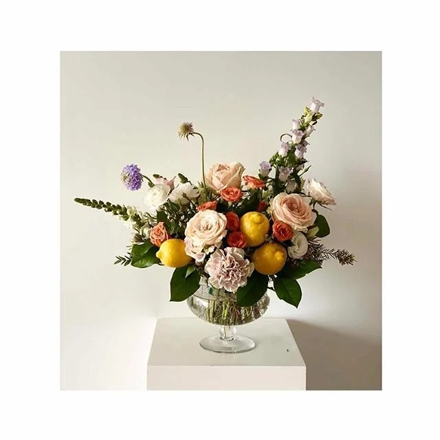 I figured I should style these lemons before I juice them and literally turn them into #lemonade! 💛 
#whenlifegivesyoulemonsmakelemonade .
.
.
.
.
#yellowismyfavoritecolor #sunshineyellow #lemonfloraldesign #lemonarrangement #fruitarrangement #compo