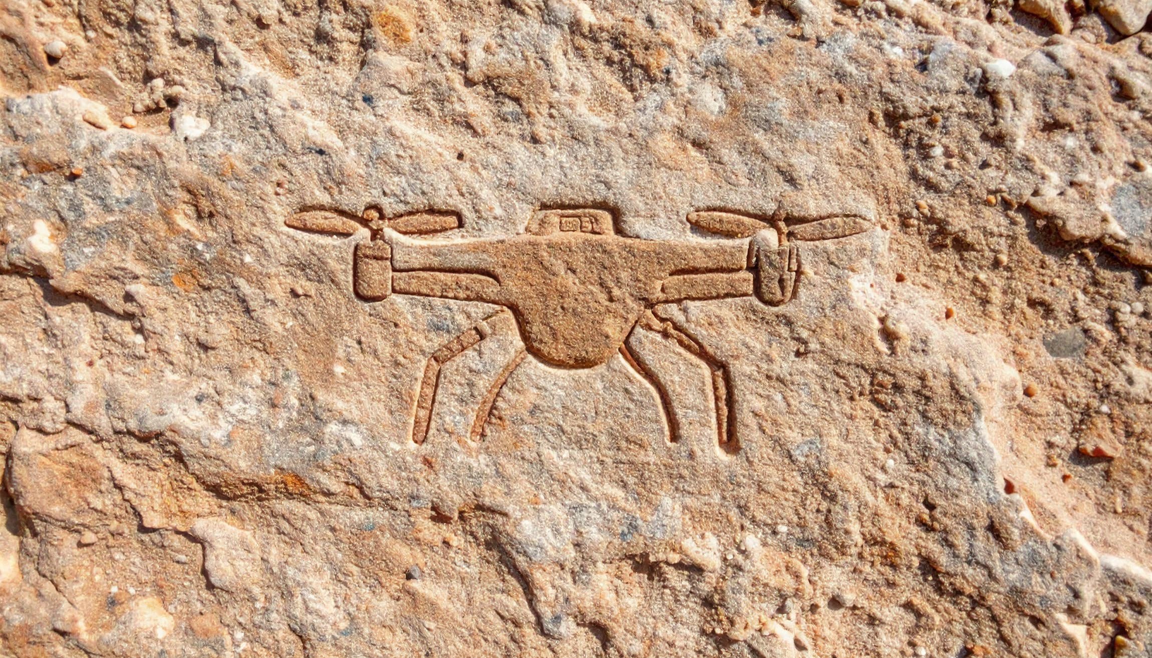 Drone_Art pariétal Une-gravure-rupestre-représentant-un-drone 863285.jpg