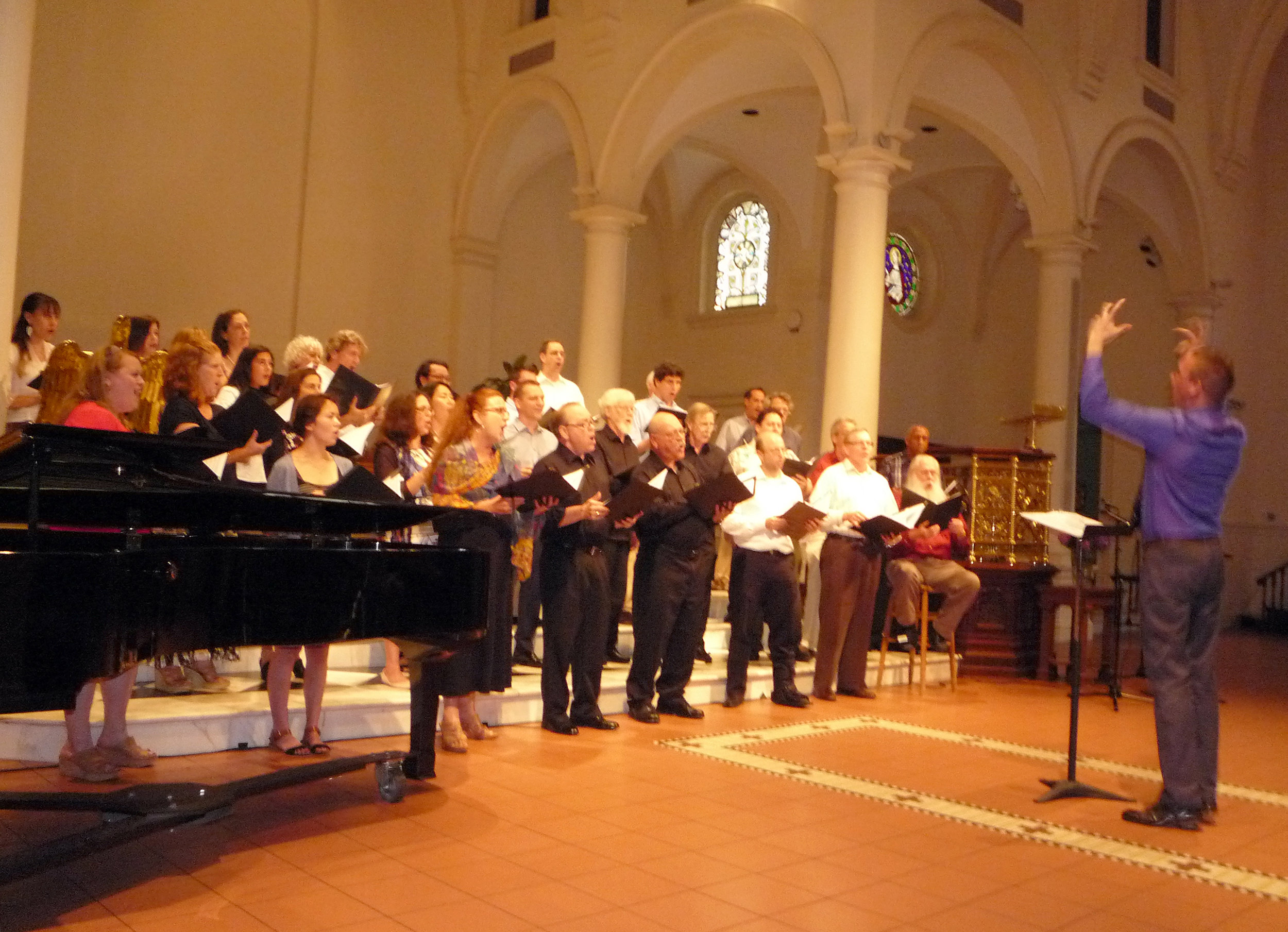 Matthew Oltman conducts the William Appling Tribute Chorus