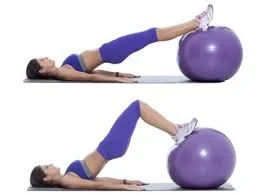 Stability Ball Bridge hy : Strengthens the gluteus maximus and multifidus (small muscles in the back for spinal stability) How: Lie on the ground with your feet on a stability ball, arms extended out or by your side. Lift your hips up off the floor so your body is in a straight line from knees to shoulders and hold. Try to hold for 60sec without the hips dropping. As you get stronger you can move the ball out toward the calves, then the heels for more of a challenge. Also, progress your arms from outstretched 90 degrees to your body to parallel beside your body, then lift them up 90 degrees straight into the air. There are many more exercises to consider, but these are 3 to start with.