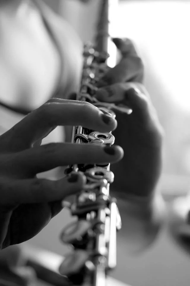 Close-up of hands playing flute during a private music lesson at AB Music School in Merrimack, NH