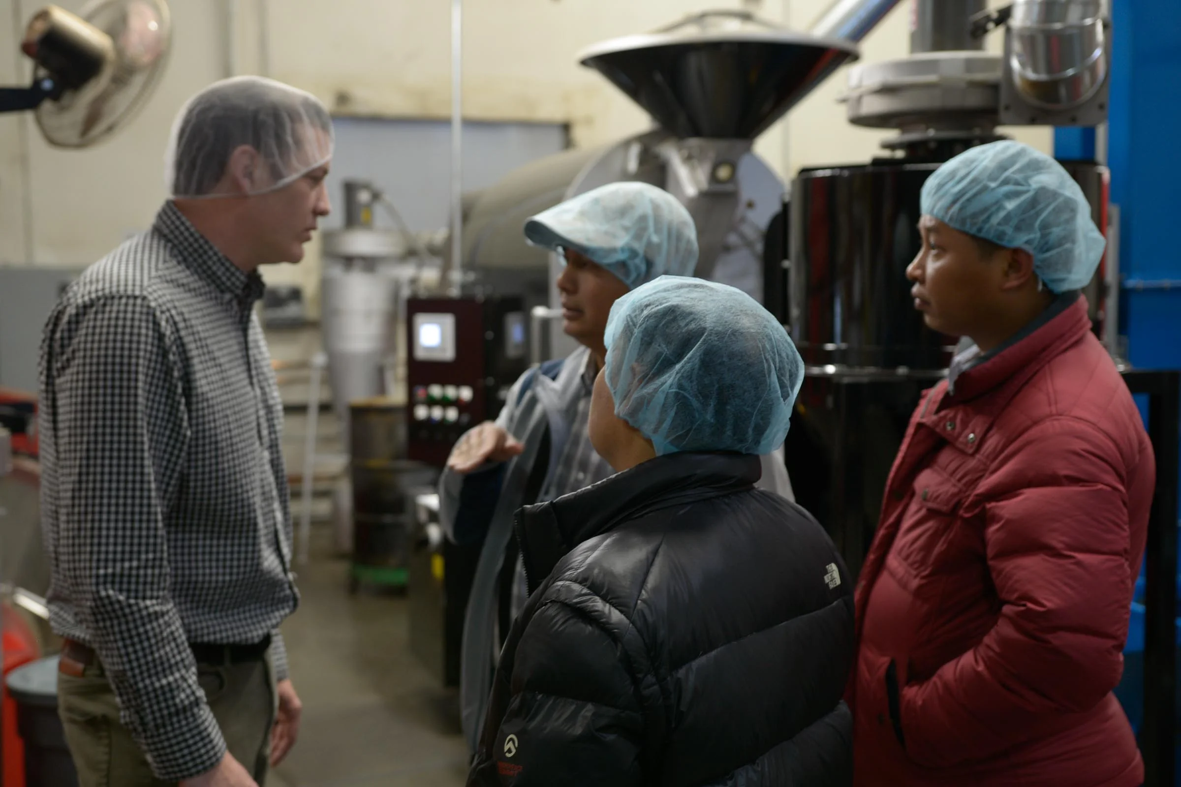 Phil Beattie Guides the Port to Cup Tour at Dillanos Coffee Roasters Facility in Sumner, Washington