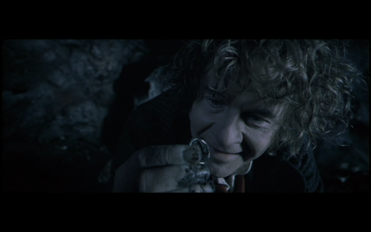 Thinks nothing of all the bones lying on the ground nearby, goes straight for the gold.