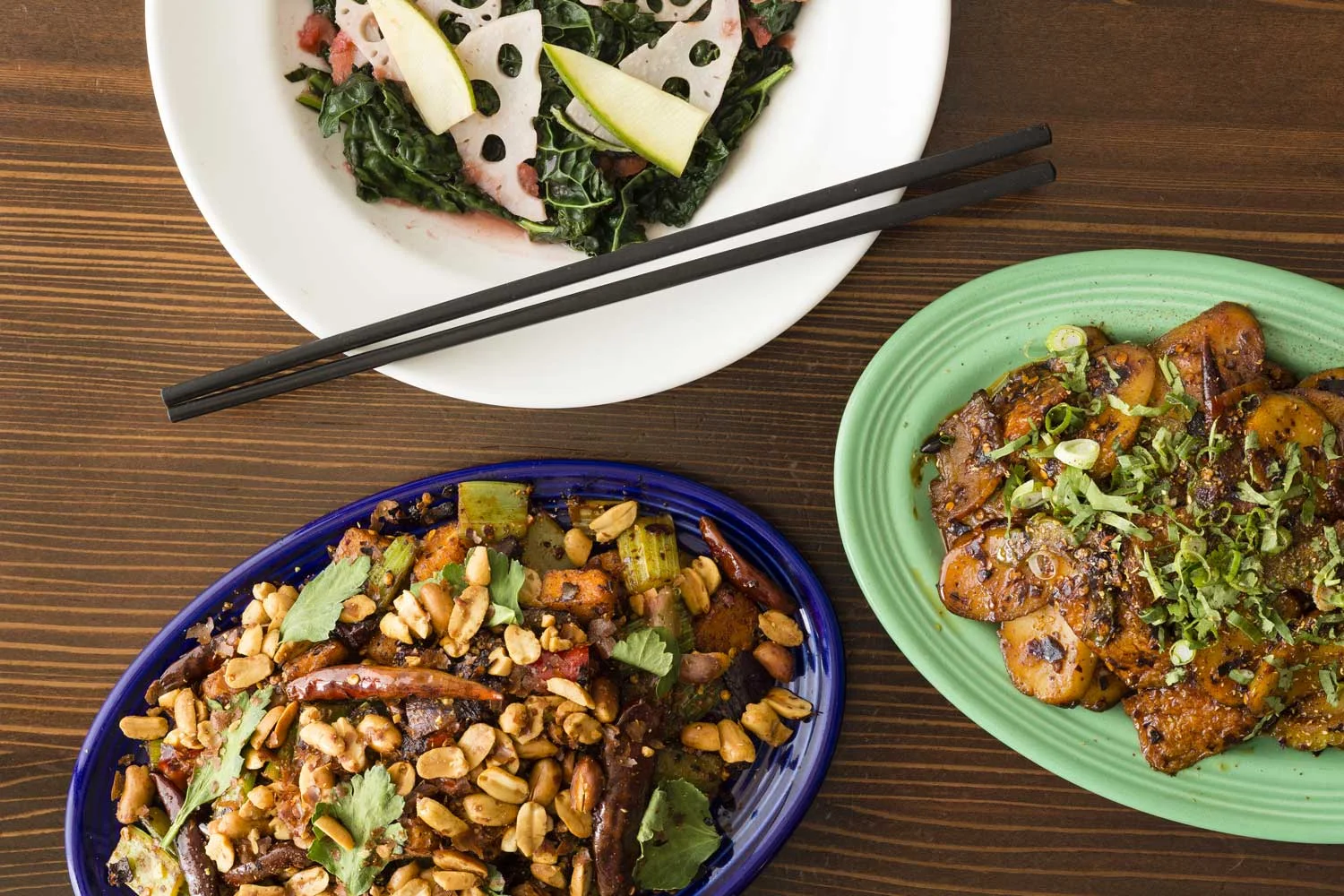 Clockwise from top: Danny Bowien's Black Kale, Thrice Cooked Bacon & Kung Pao Pastrami photo courtesy of Andrew Rowat