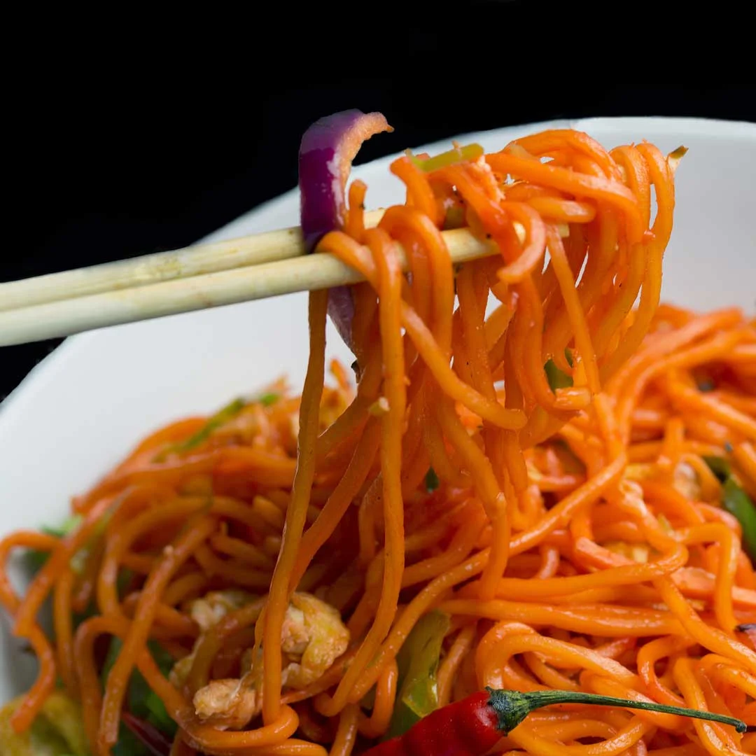 "Indians first made their acquaintance with Chinese food over sweet corn chicken soup, Hakka noodles and mixed fried rice. " p hoto by John Hoey (Flickr)
