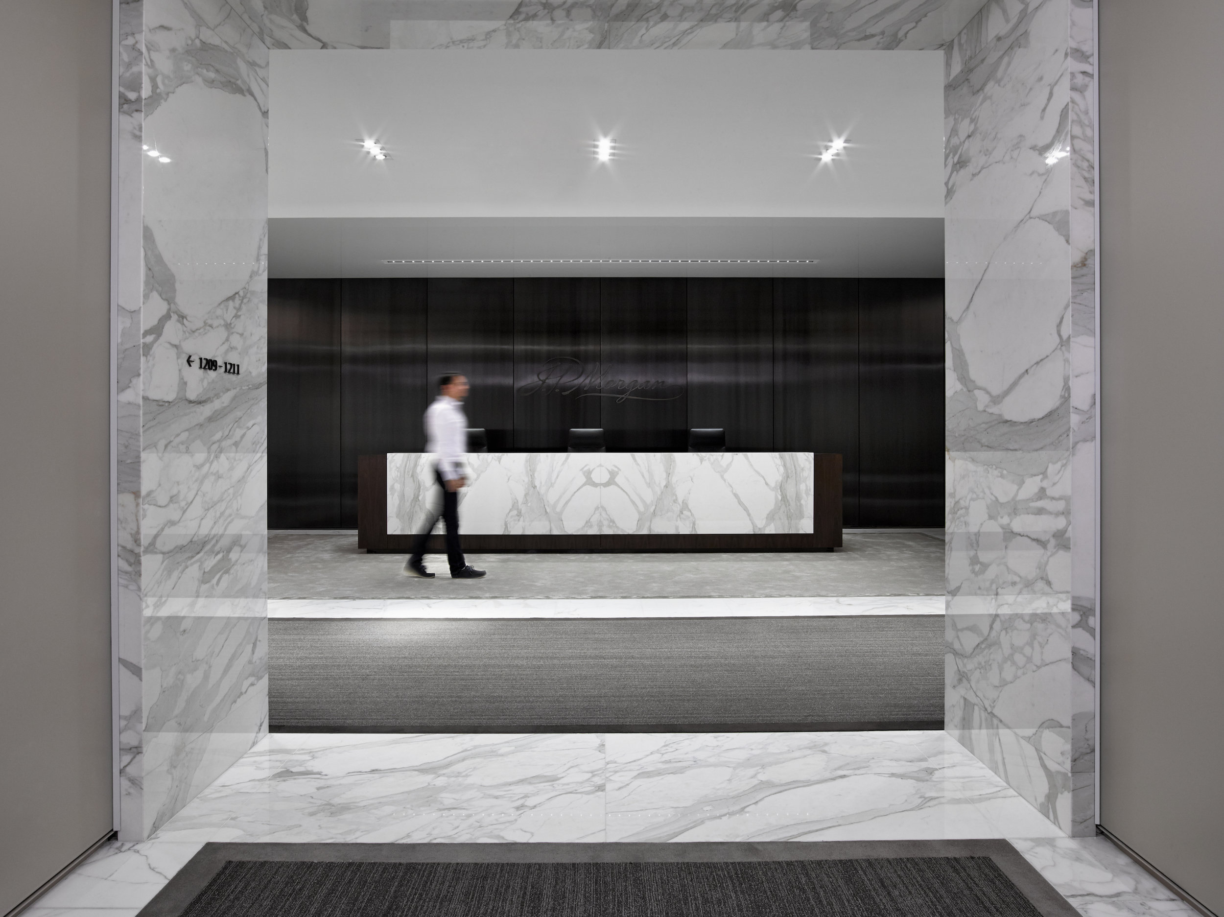   Chase: Wealth Client Management   Floors and walls, on reception and elevator lobby. Calacatta gold, and ¾ inch slab Material. 