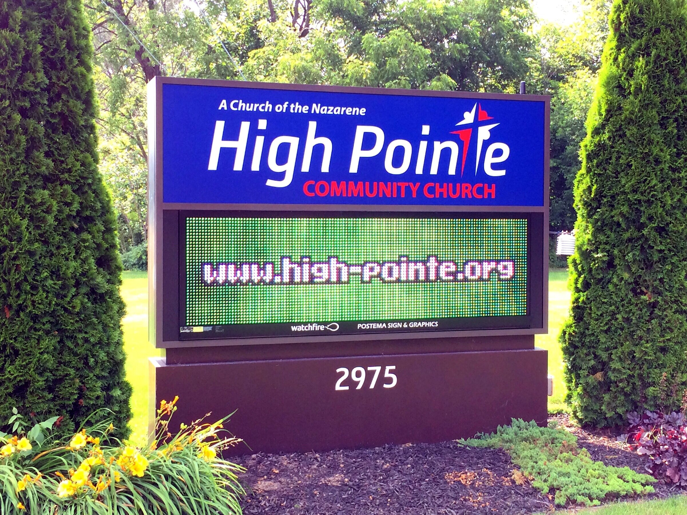  Monument sign with polycarbonate faces, vinyl graphics an aluminum base with a Watchfire 16mm display. 
