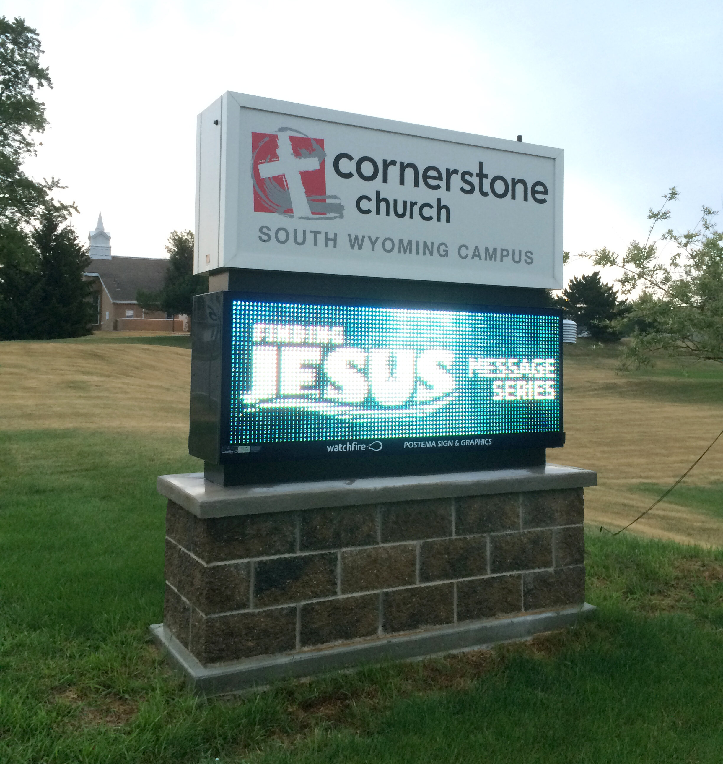  Monument sign with polycarbonate faces and vinyl graphics with a masonry base and a Watchfire 19mm display. 
