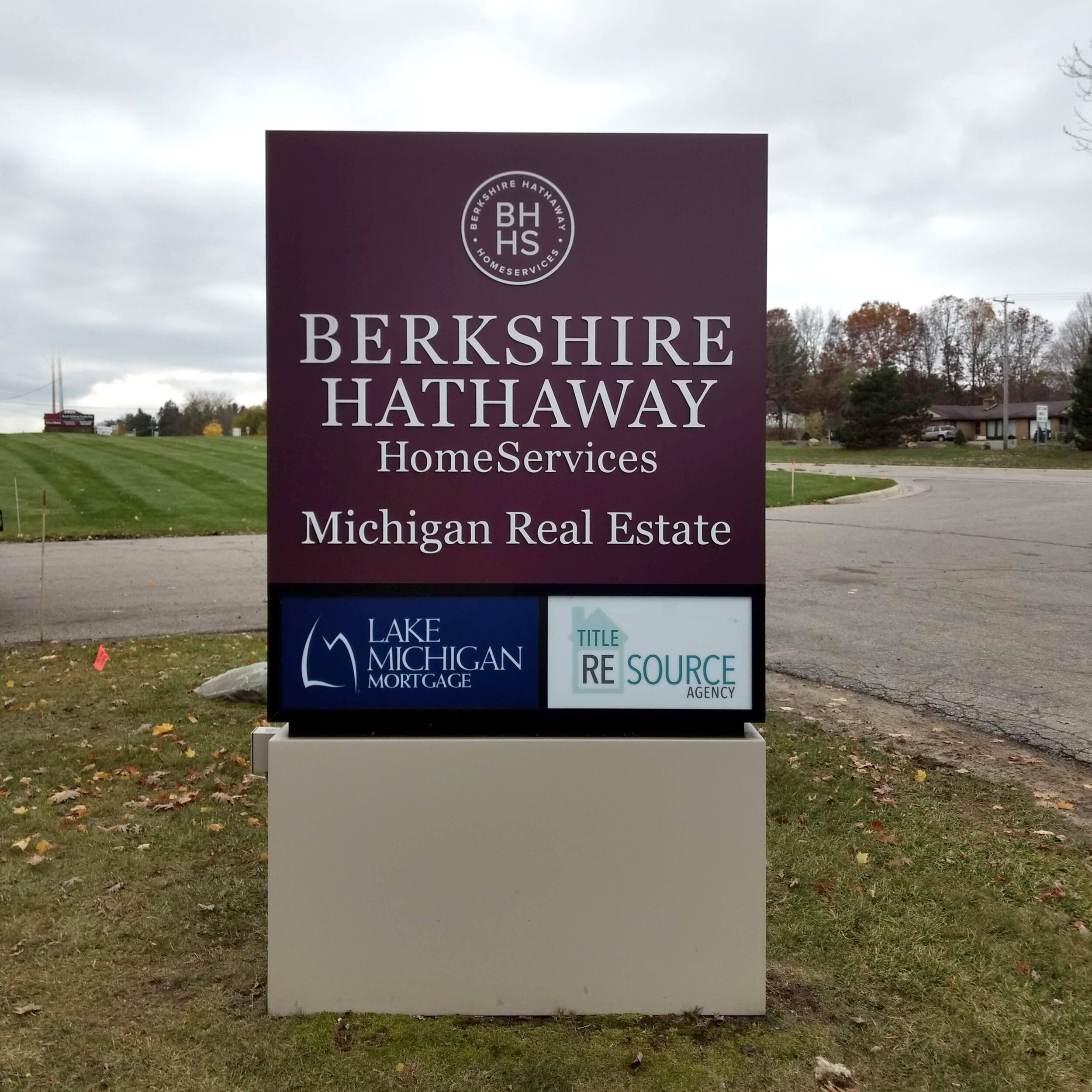  Monument sign with routed aluminum faces and push thru acrylic lettering, with two polycarbonate tenant panels and an aluminum base. 