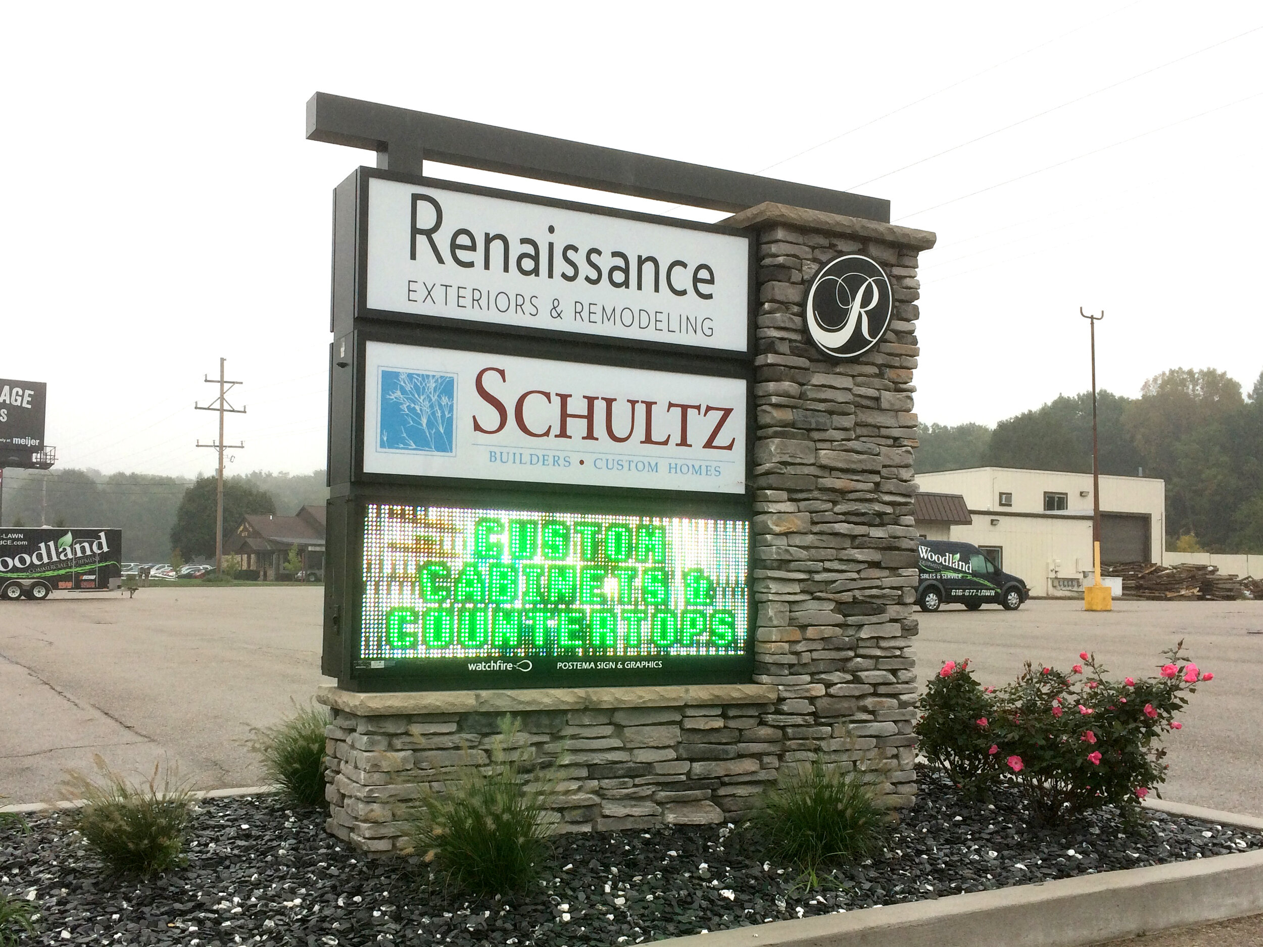  Multi-tenant monument sign with polycarbonate faces, aluminum accents, masonry column and a Watchfire 16mm display. 