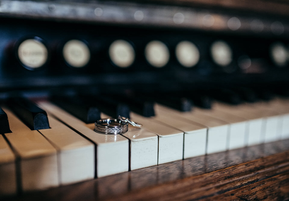 Wedding rings on piano