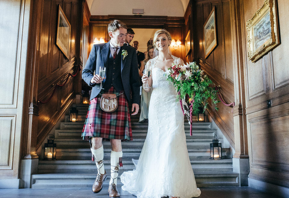 Bride and groom on stairs