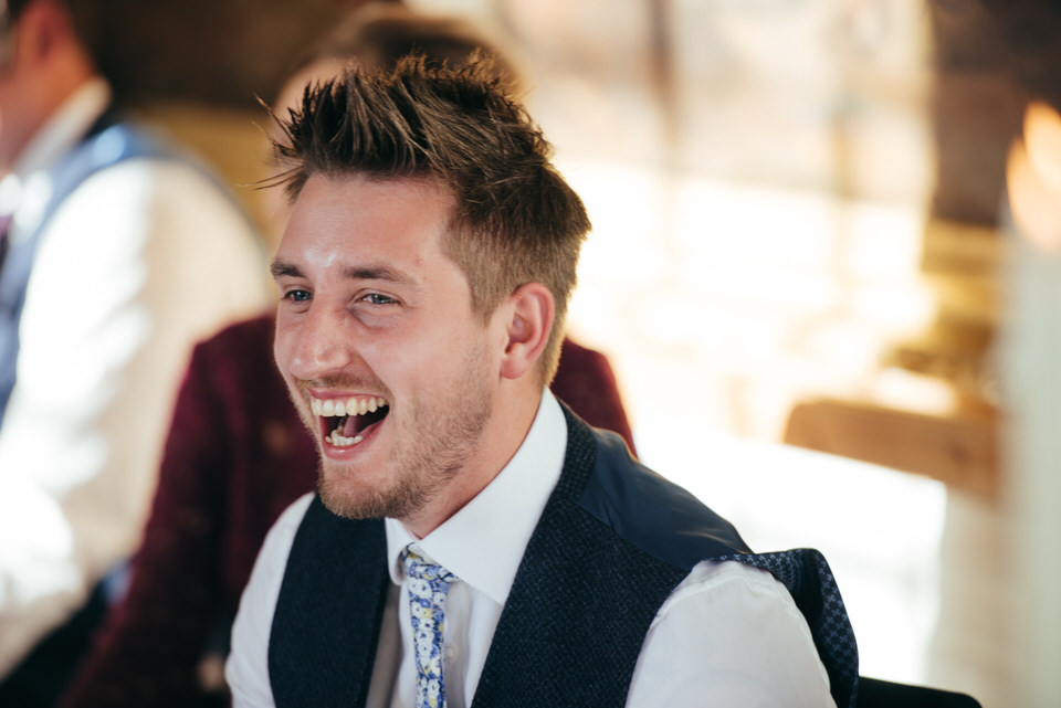 Candid laughter at wedding