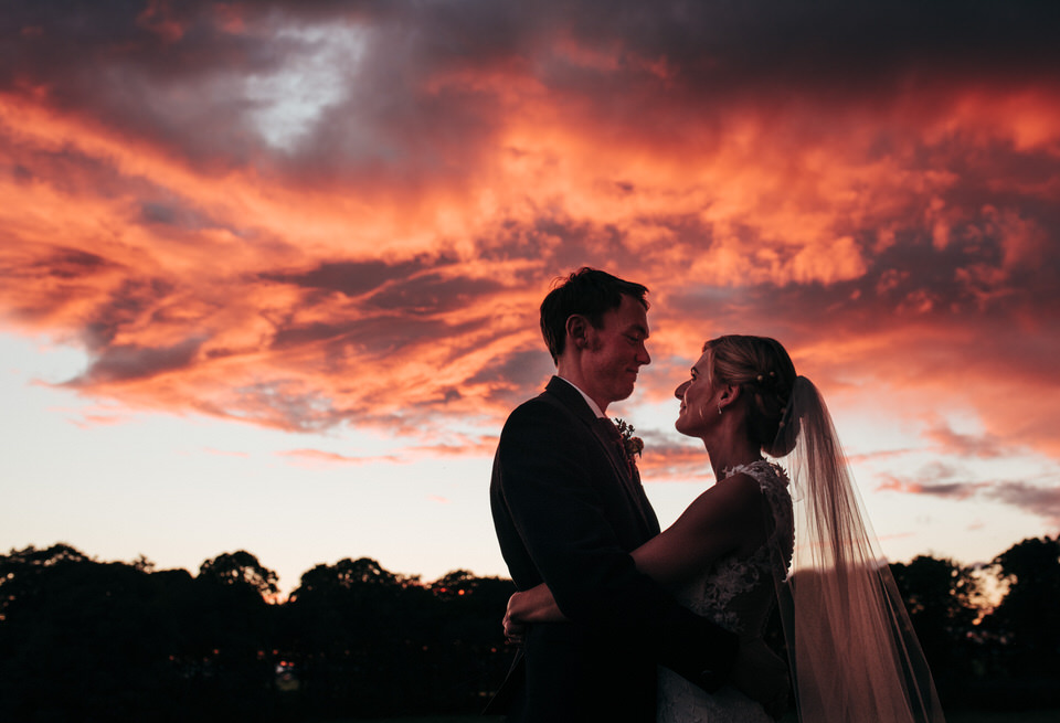 Red sky wedding portrait