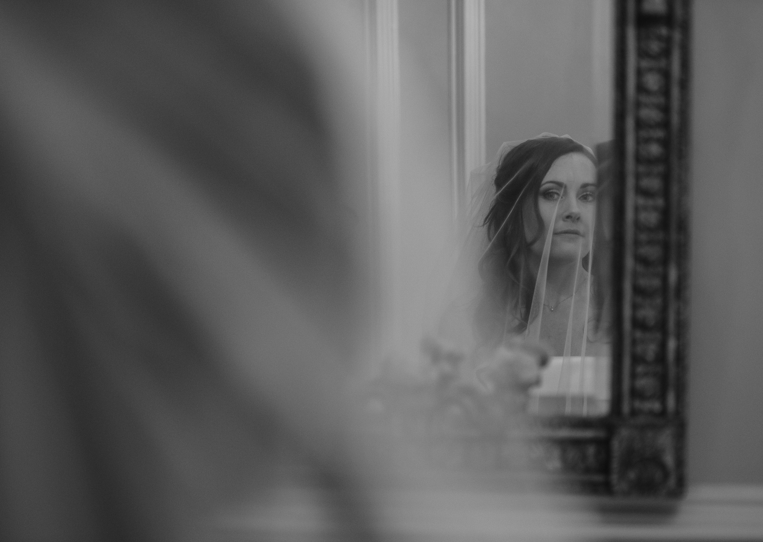 Bride looking into the mirror