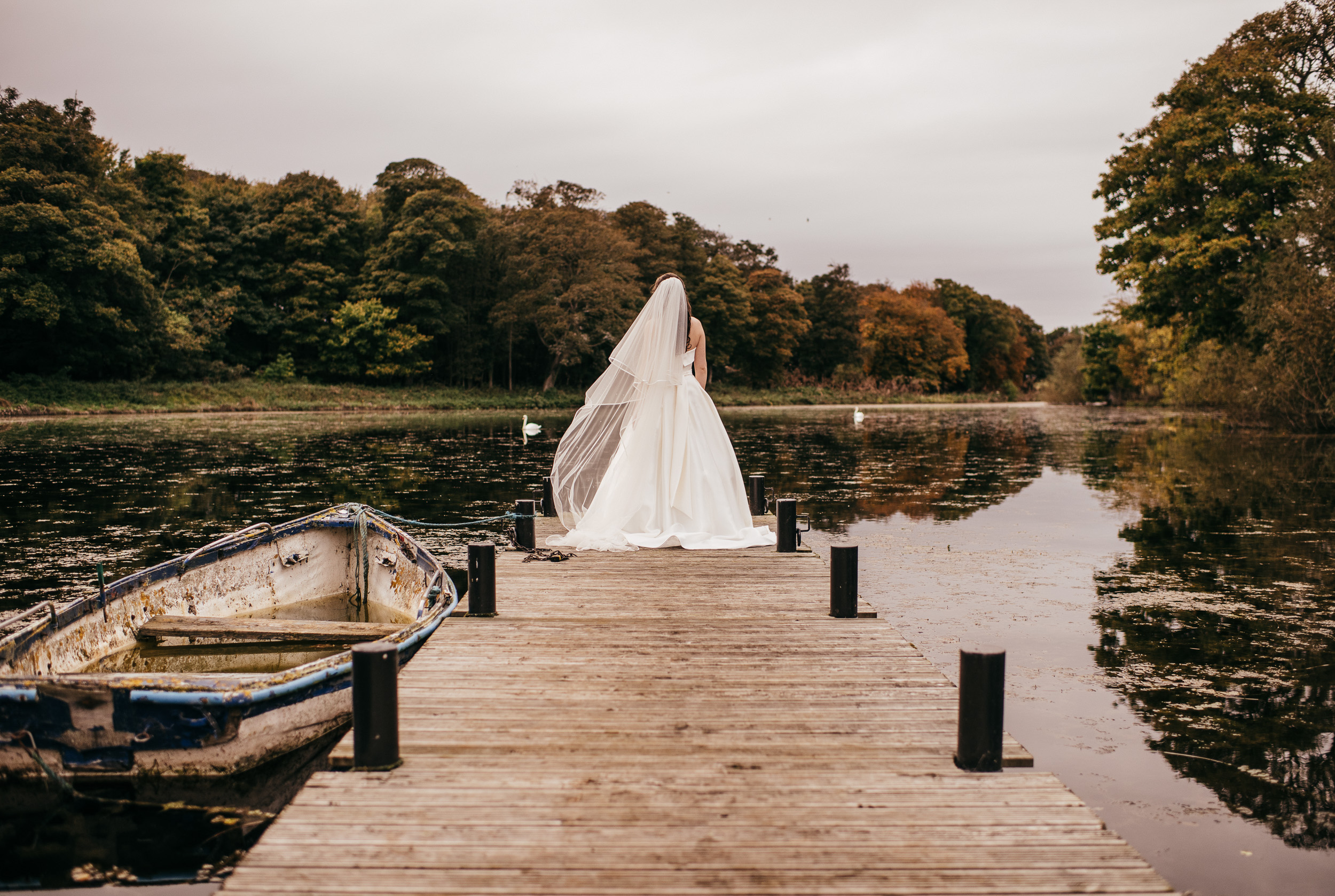 Lake jetty wedding portraits