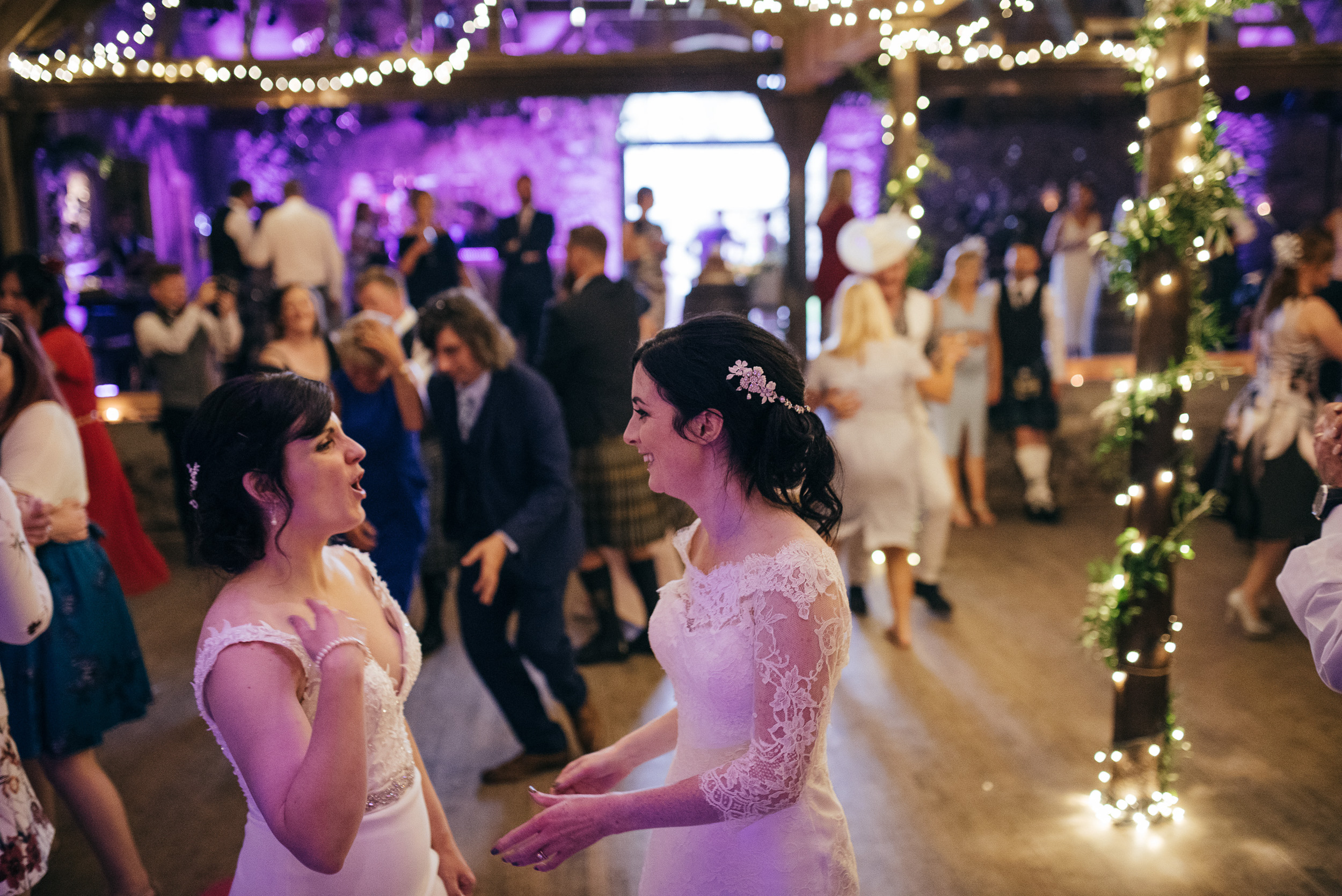 Same sex wedding dancing