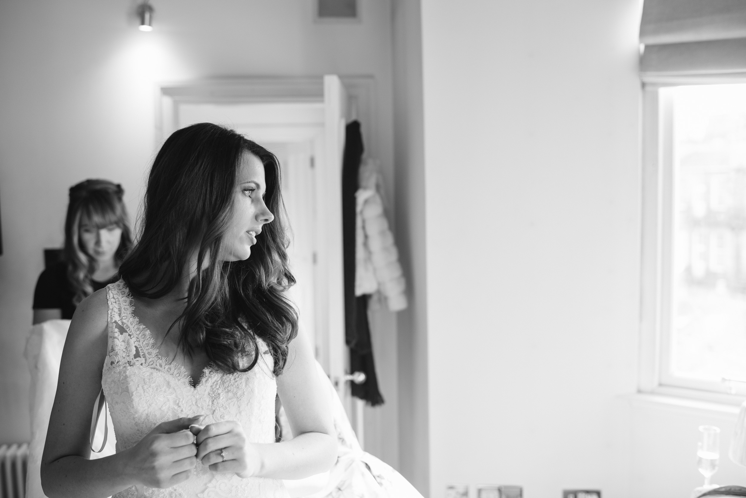 Putting on wedding dress