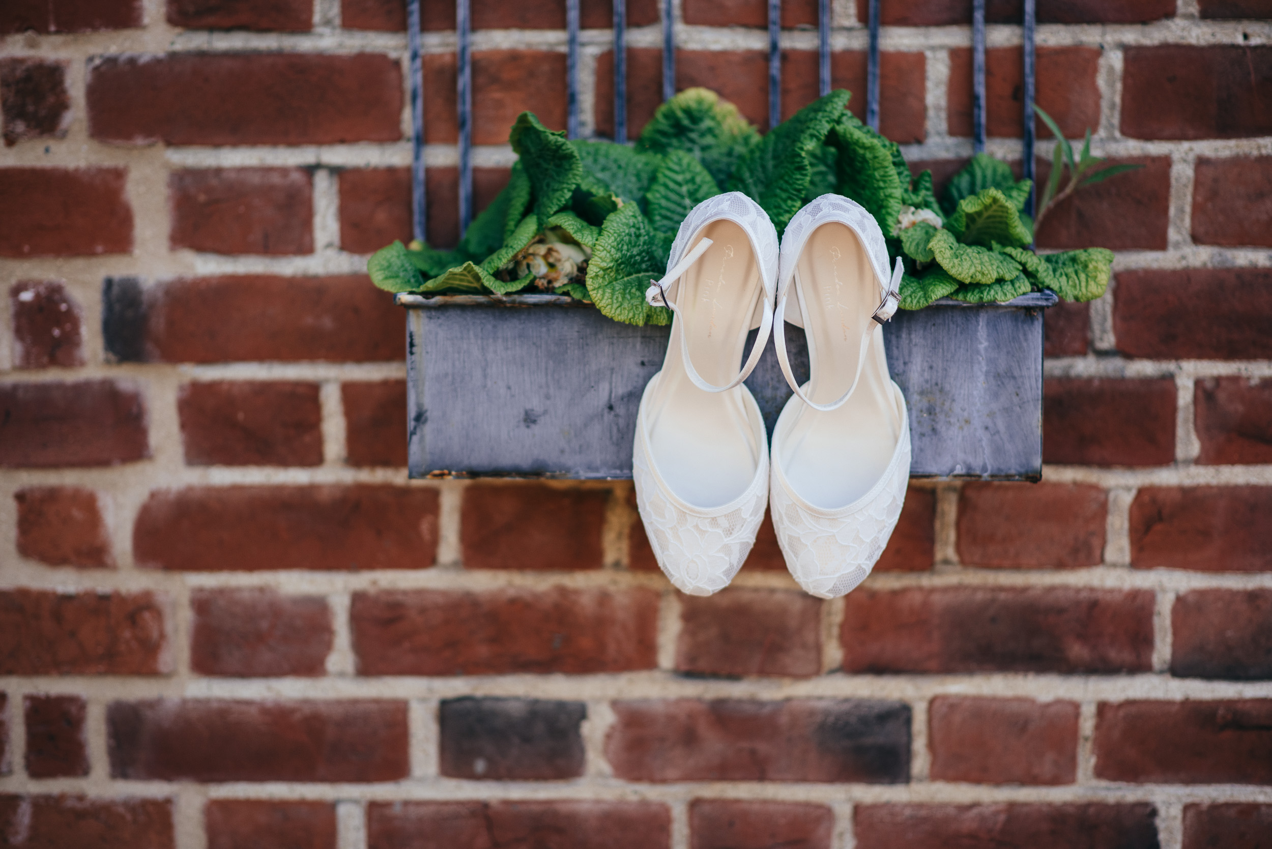 Hanging wedding shoes