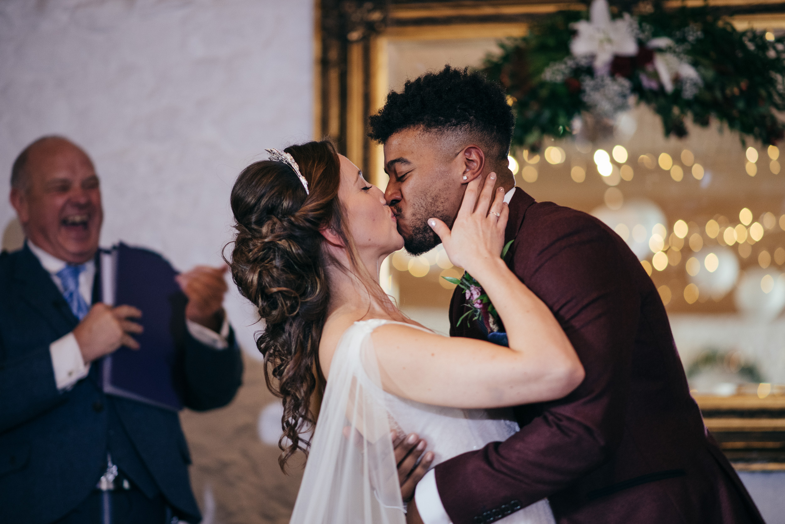 Bride and groom first kiss