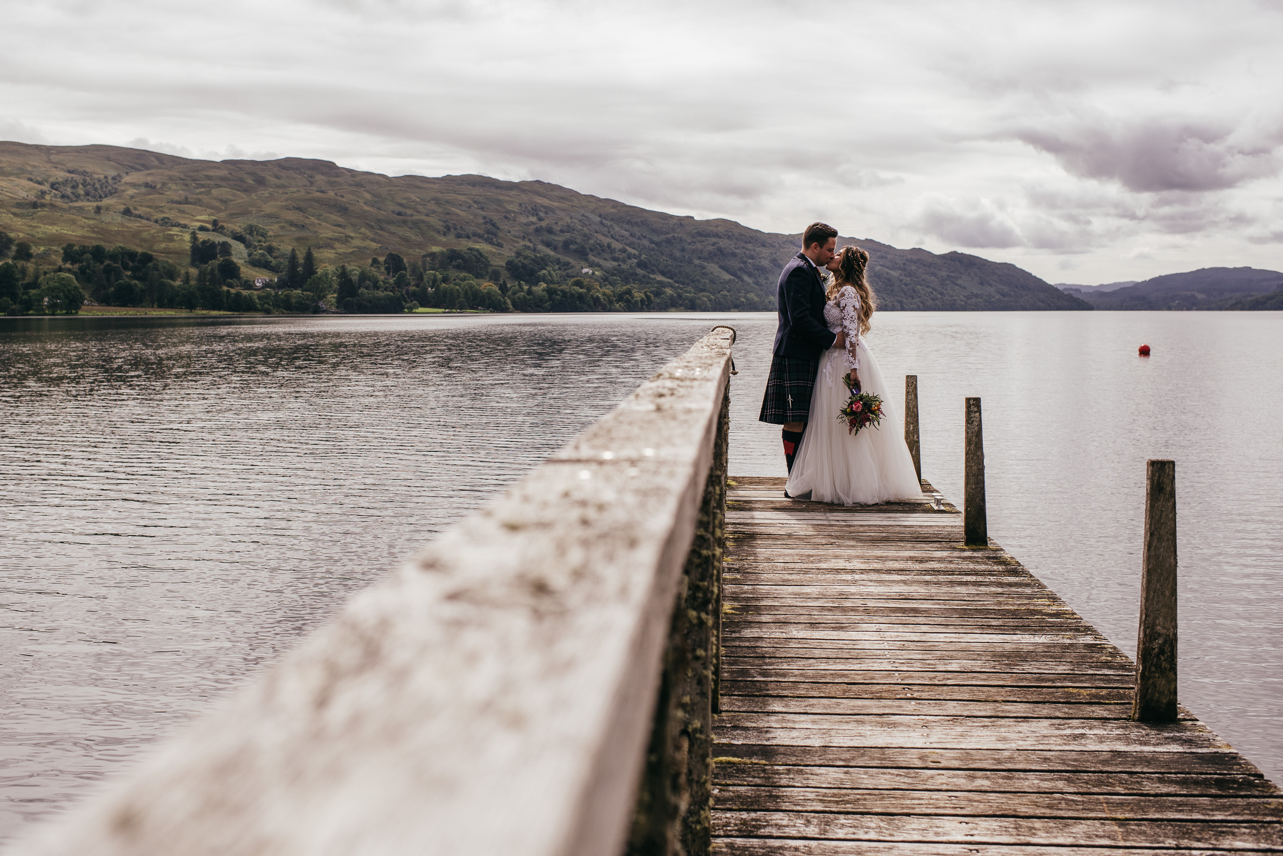 Bride and groom on jetty