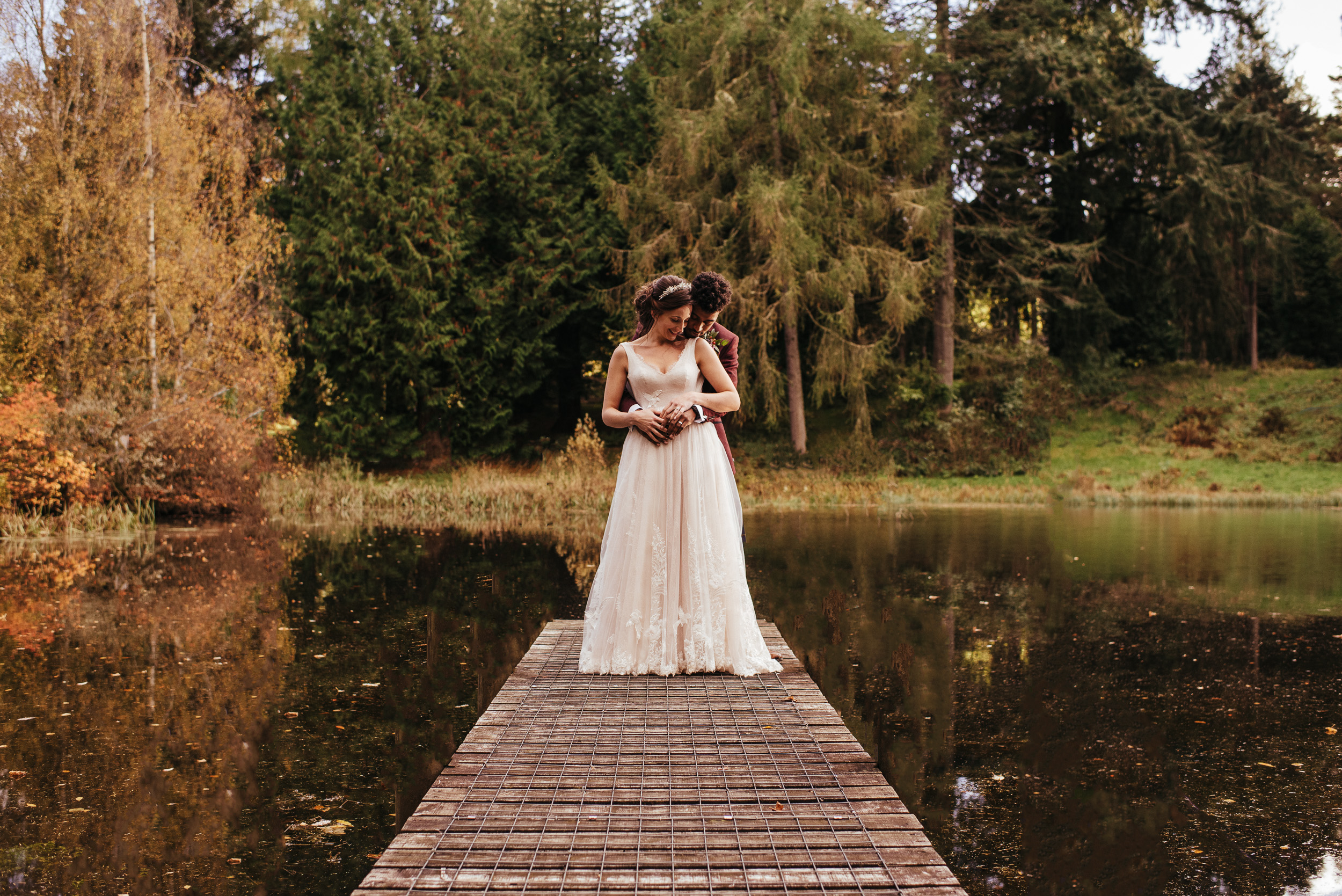 Bride and groom on jetty