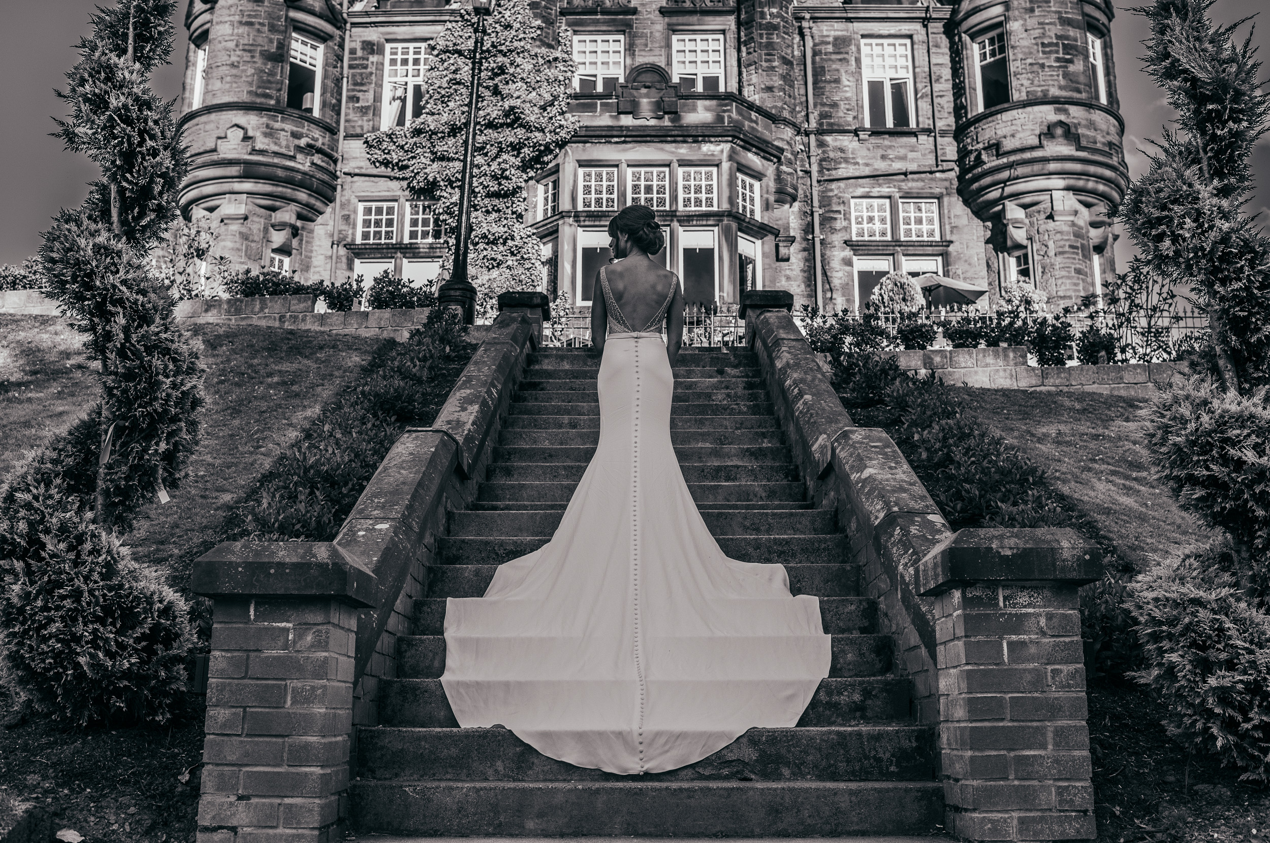 Wedding dress on stairs Sherbrooke Castle