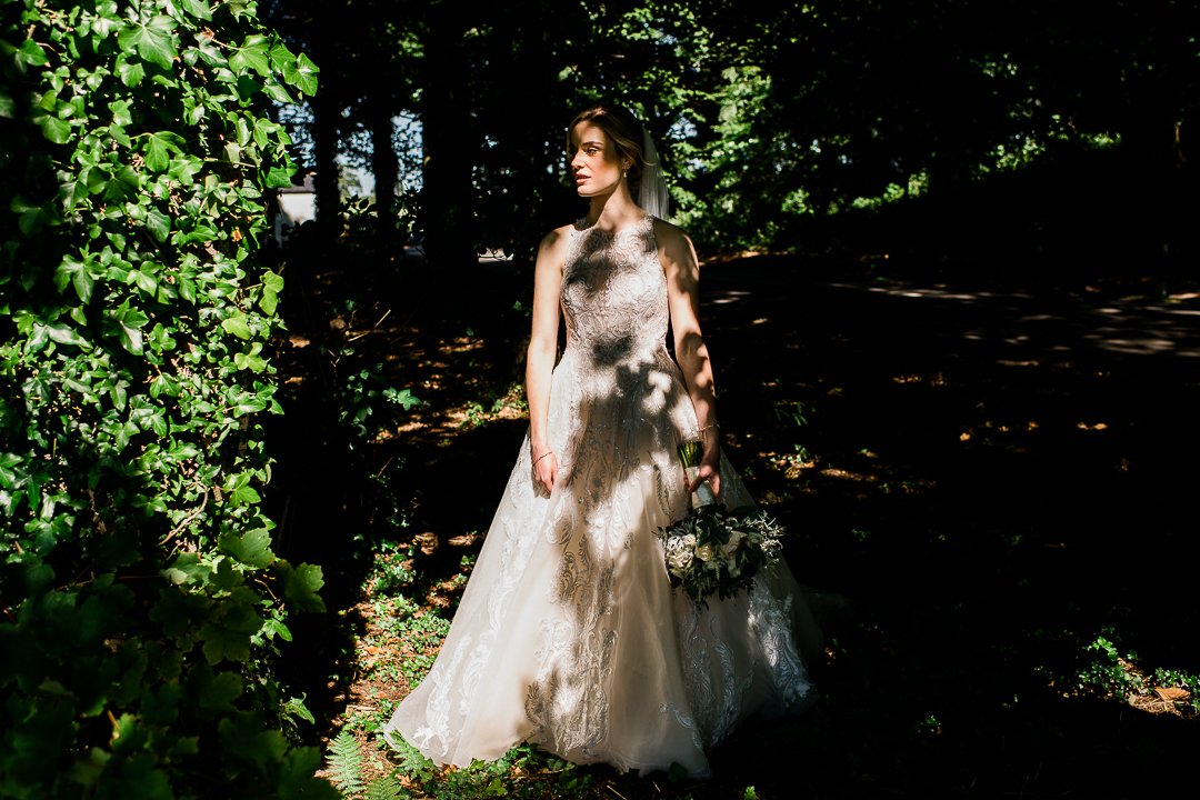 Bride woodland portrait shadow and light