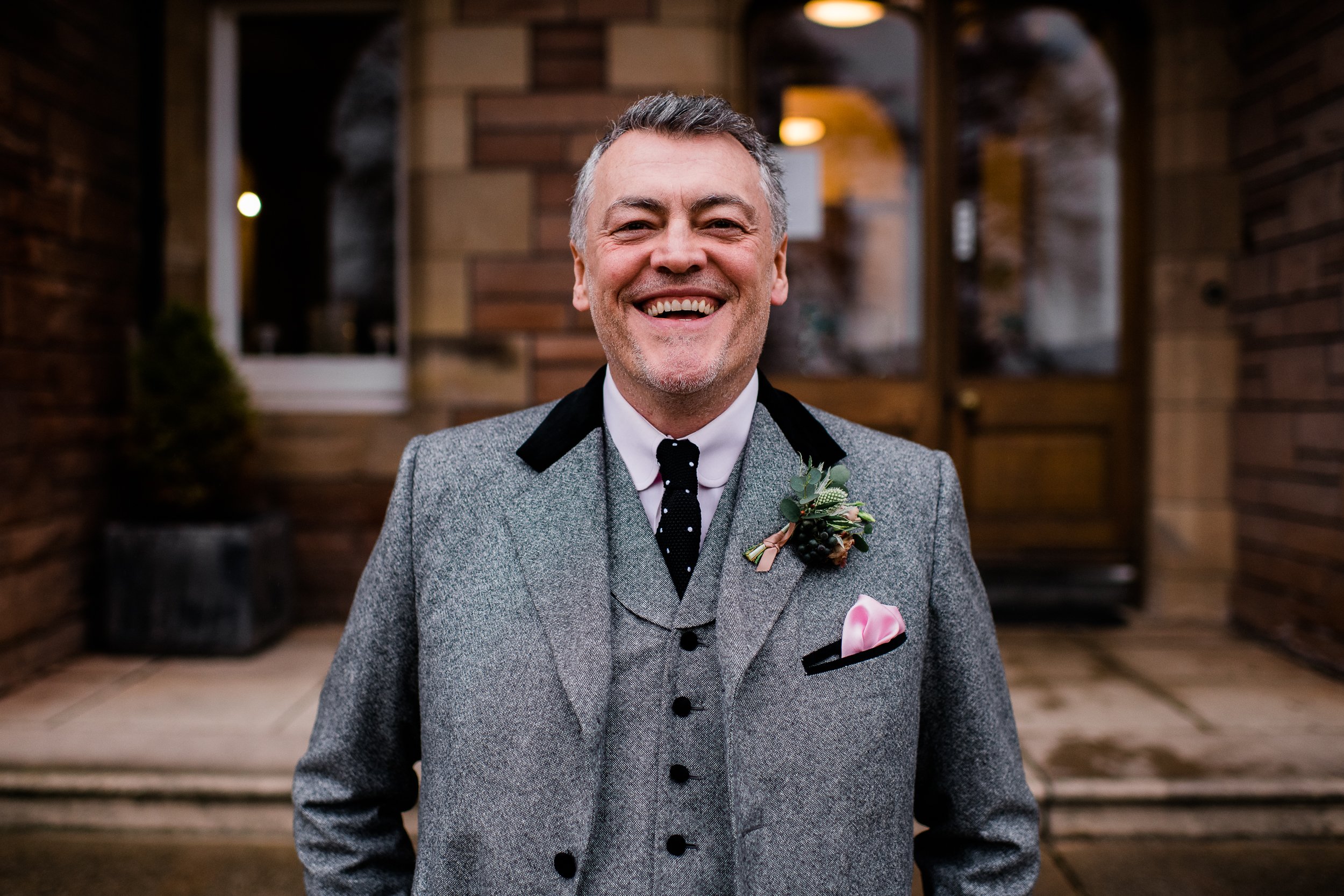 Groom portrait outside Inglewood House